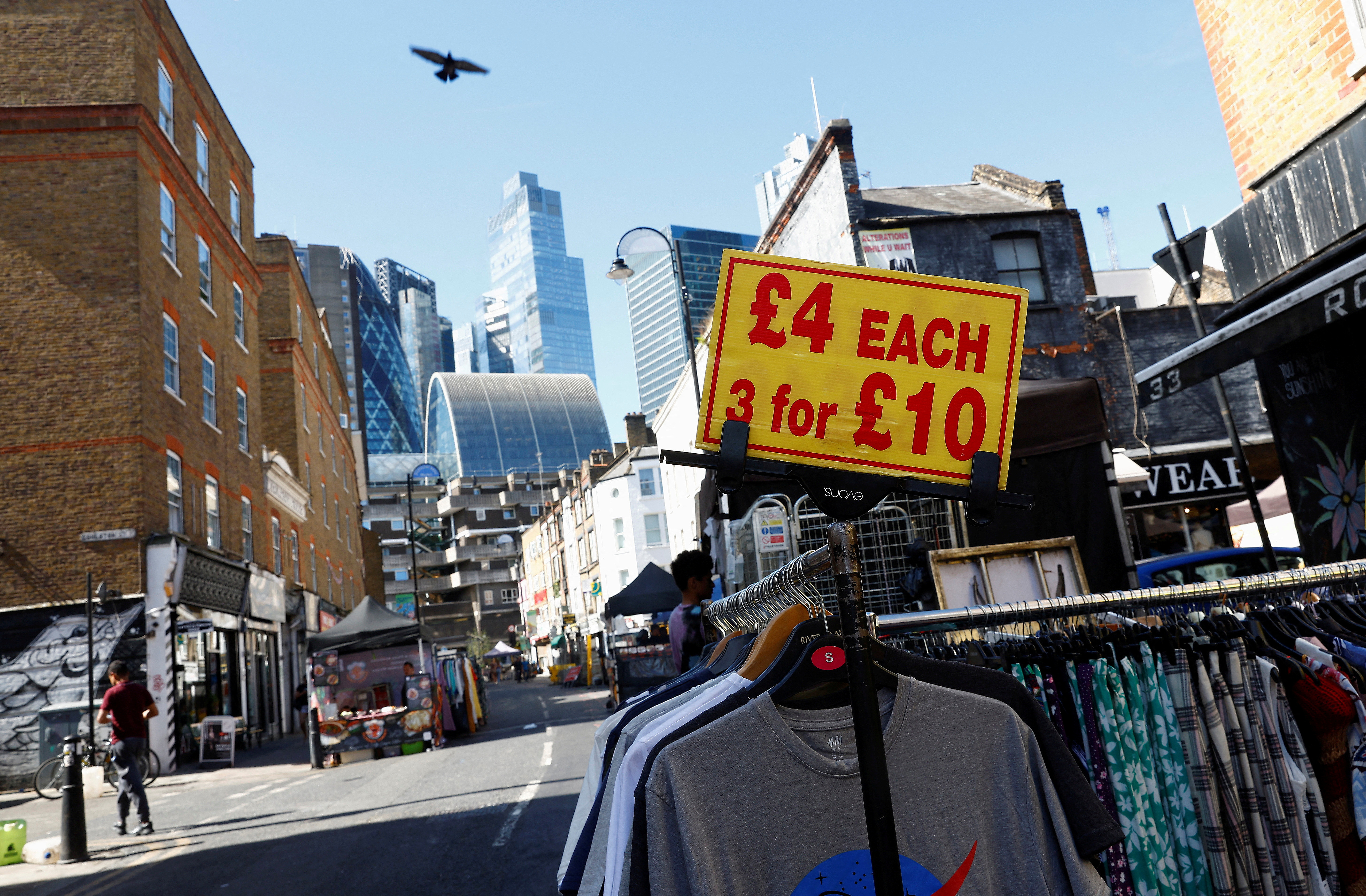 A view of City of London financial district behind Petticoat Lane street market