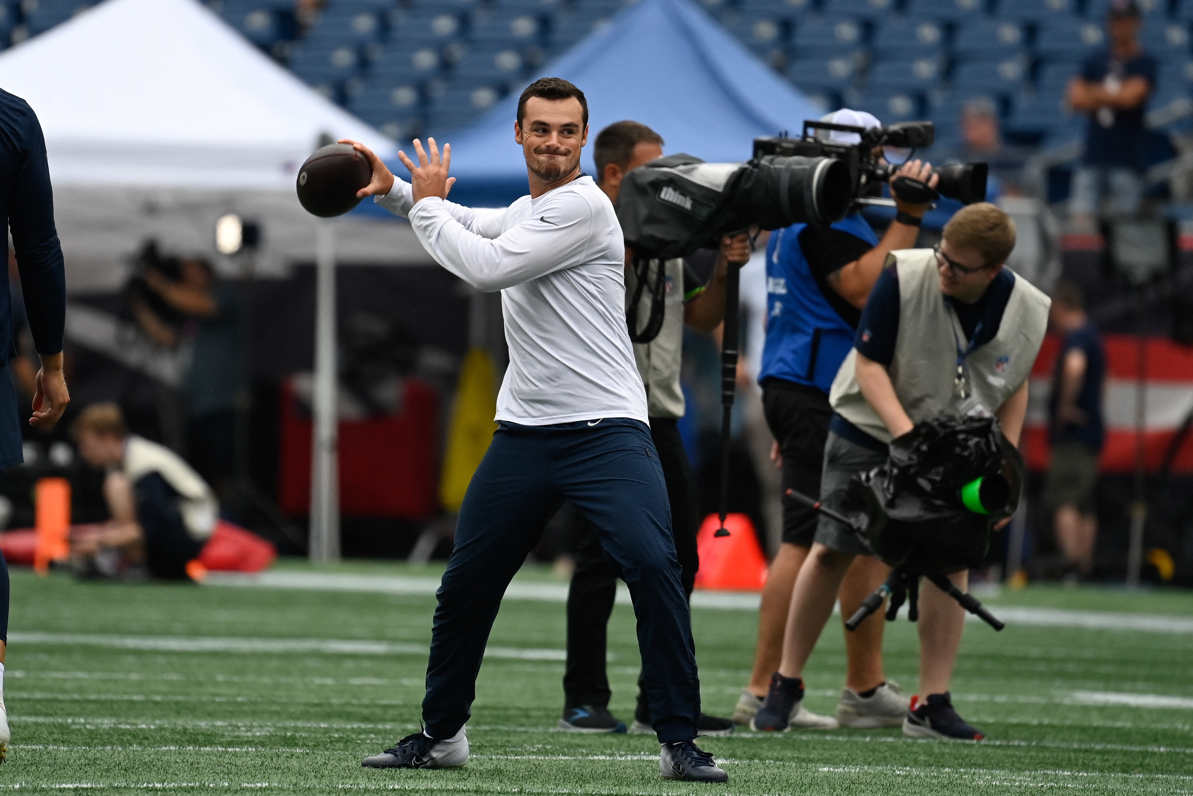 FOXBOROUGH, MA - AUGUST 11: New England Patriots quarterback Bailey Zappe  (4) tosses a pass during an NFL preseason game between the New England  Patriots and the New York Giants on August