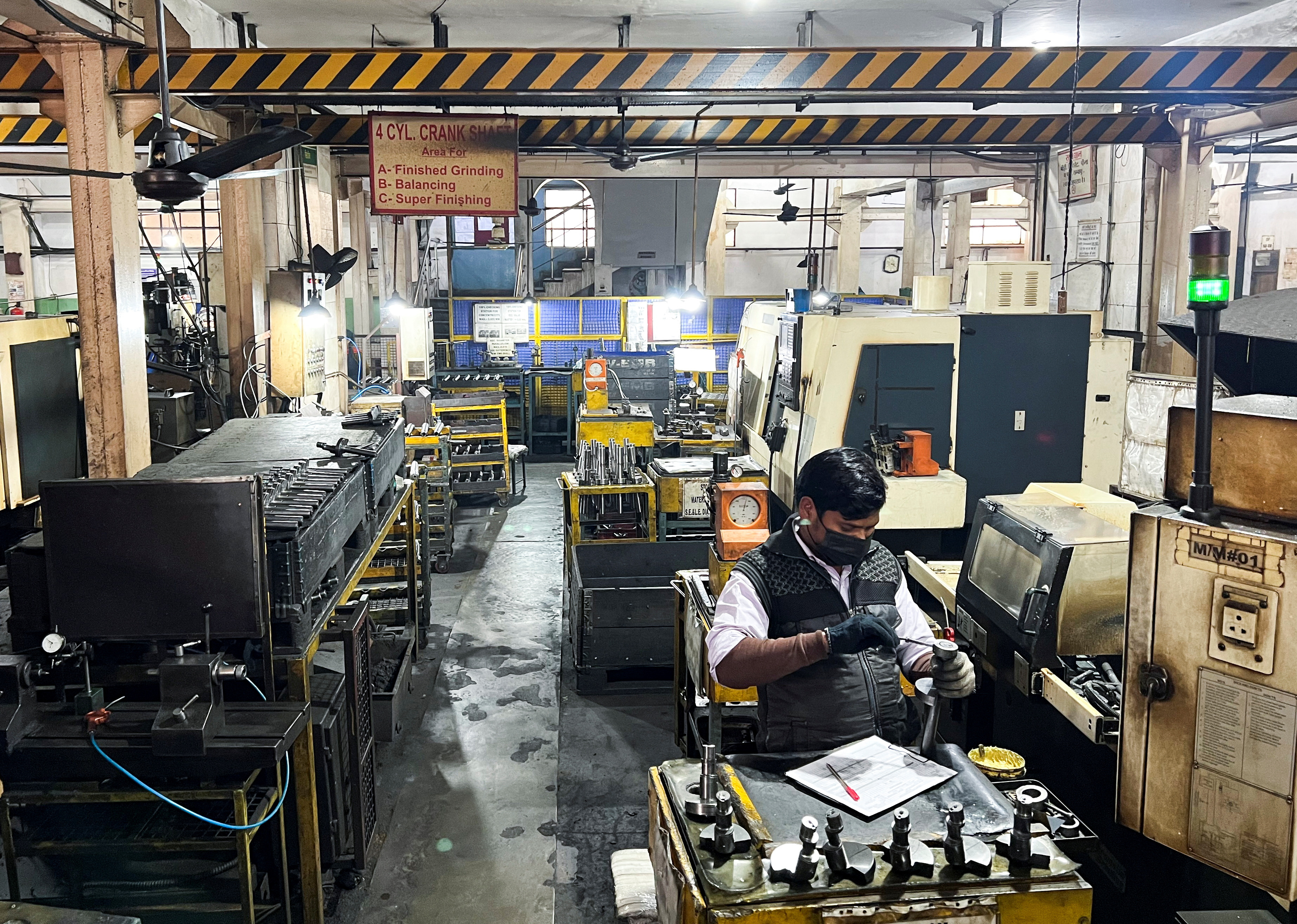 Employees working in the engineering product export department at the manufacturing base in Faridabad