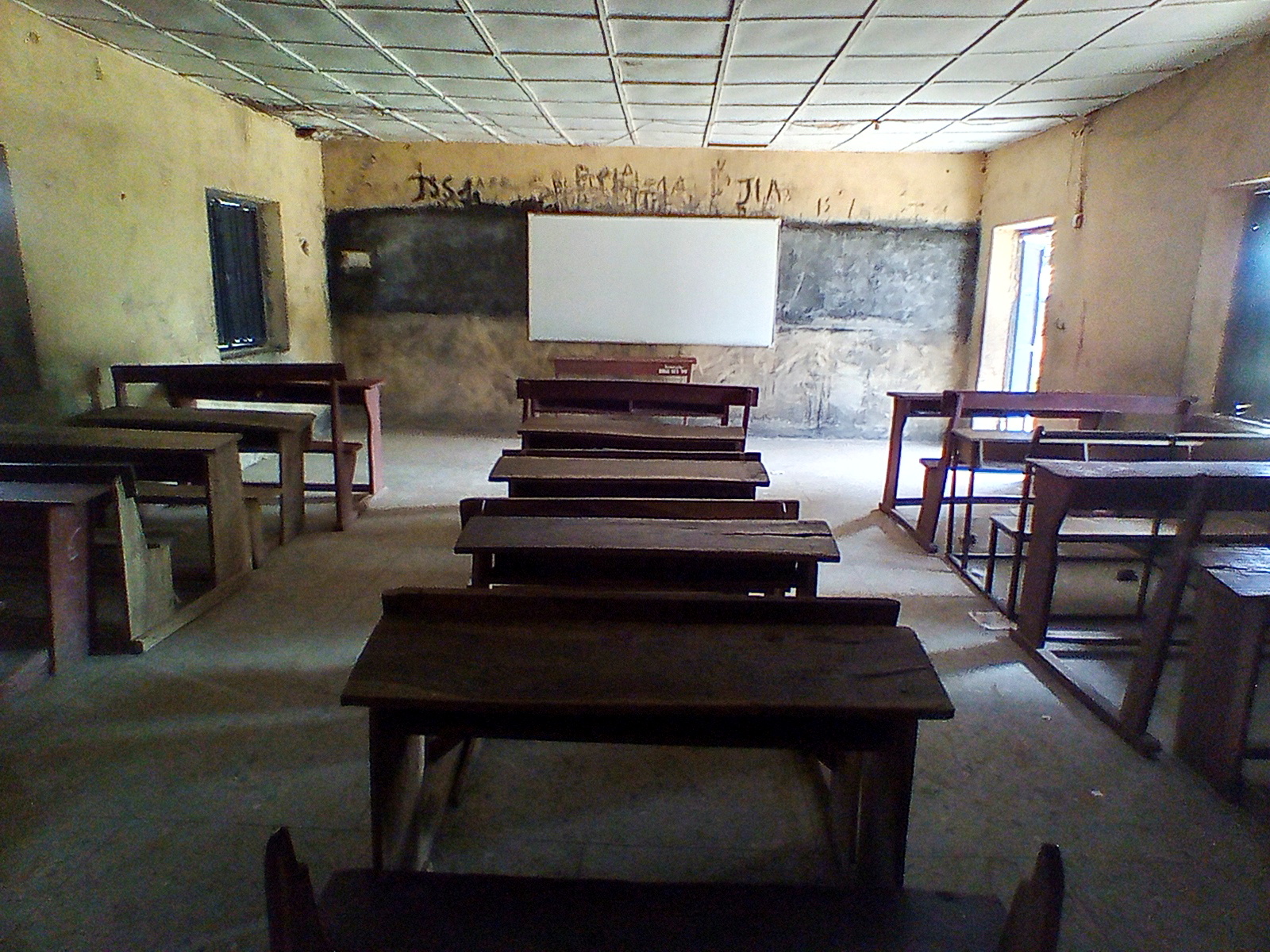 Pieces of furniture are seen inside a classroom at Bethel Baptist High School where unspecified number of student were kidnapped at Damishi, Kaduna, Nigeria July 7, 2021. REUTERS/Bosan Yakusak  