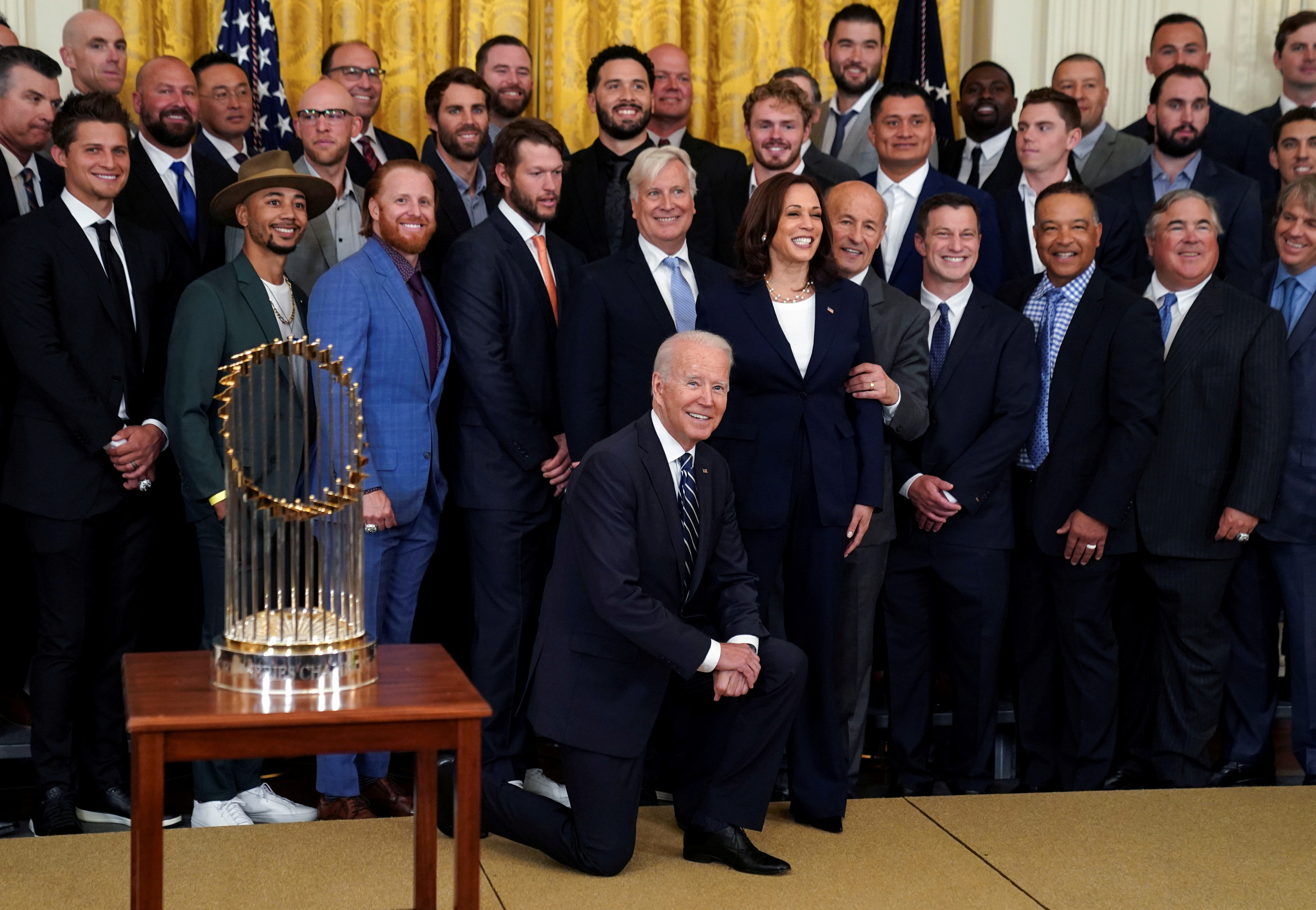 U.S. President Joe Biden and Vice President Kamala Harris pose with members of the 2020 World Series Champion Los Angeles Dodgers during an event honoring the team at the White House in Washington, U.S., July 2, 2021. REUTERS/Kevin Lamarque/