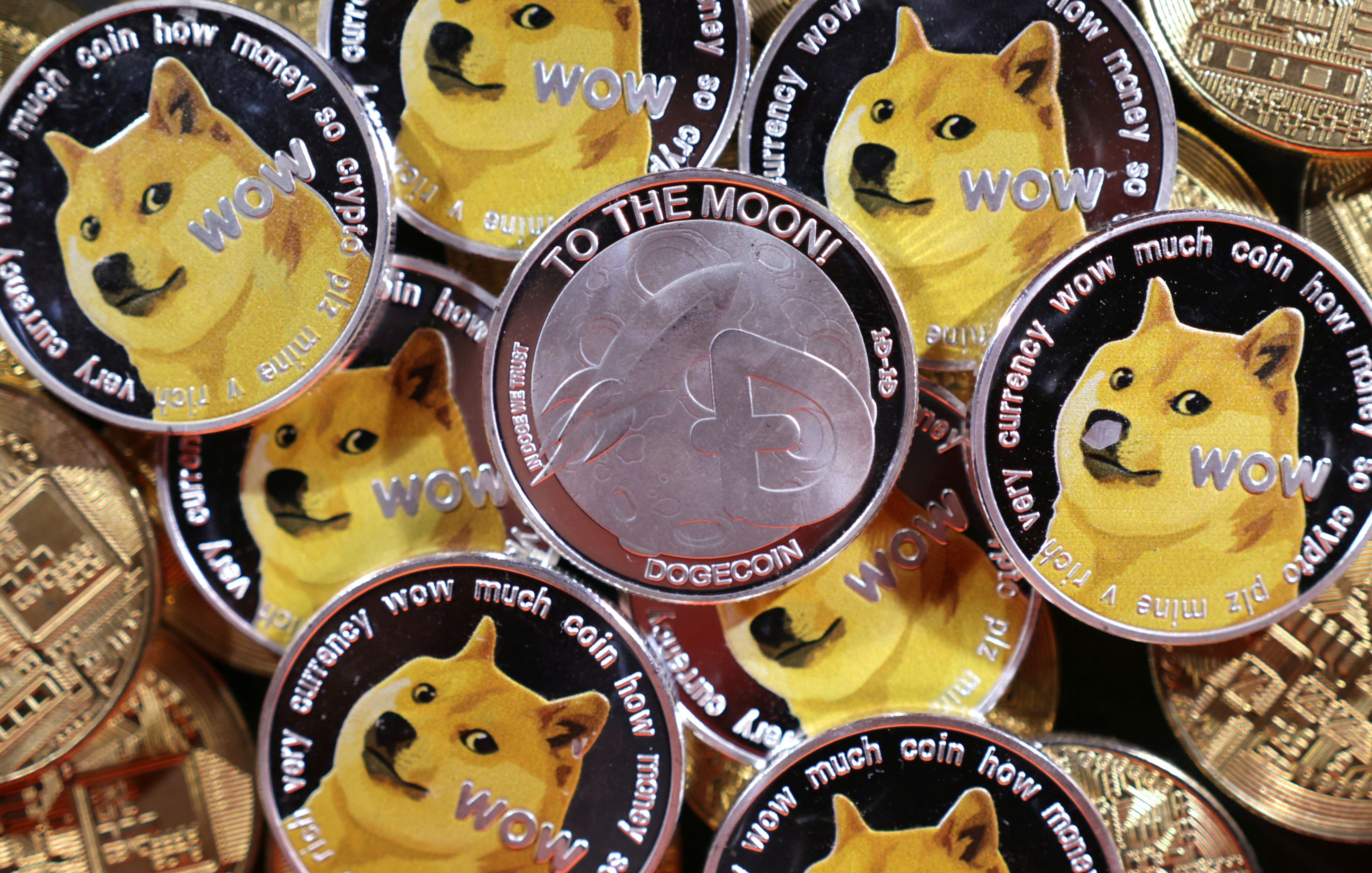 Illustration shows representations of cryptocurrency Dogecoin