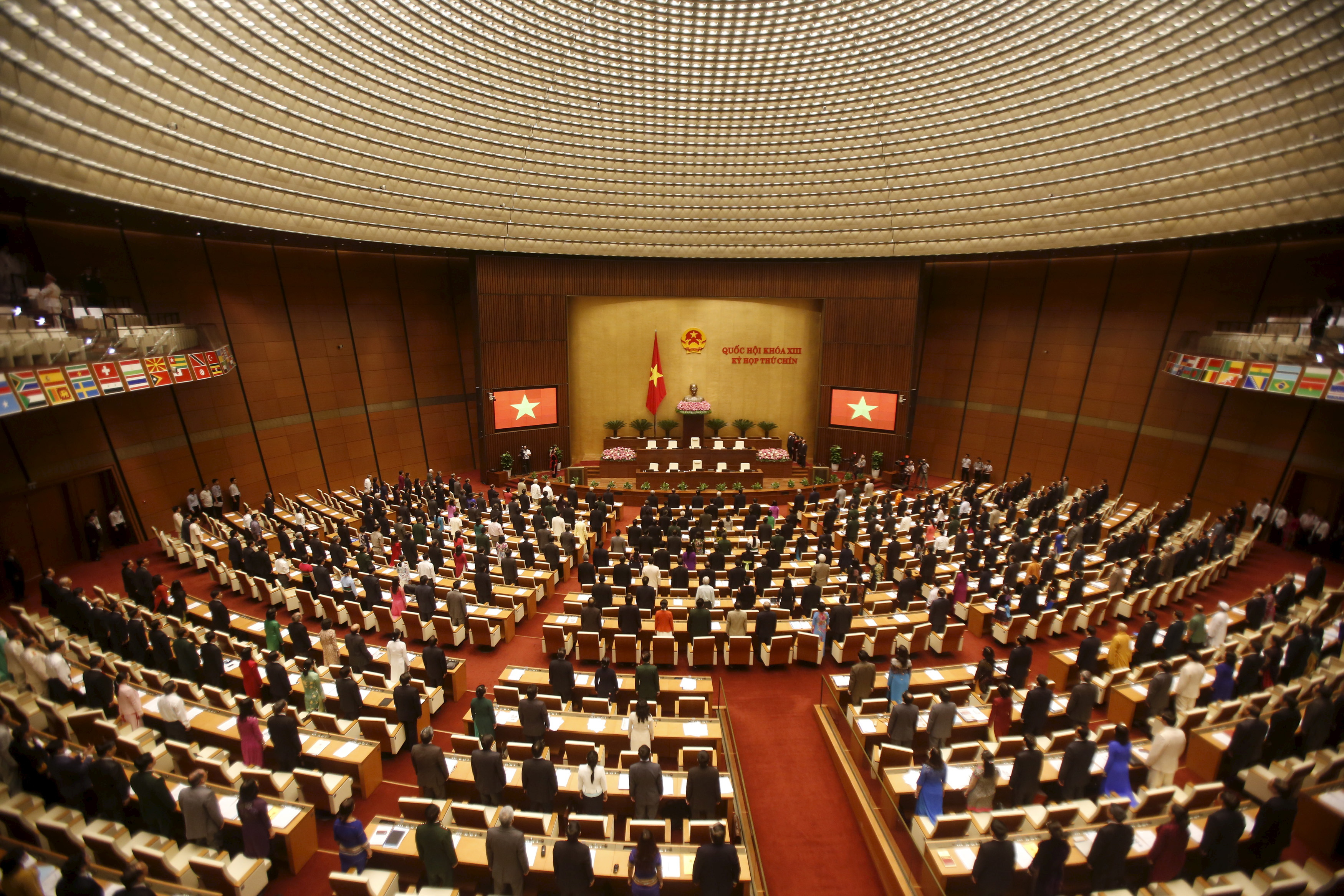 Officials attend the opening ceremony of parliament's Economic Commission spring session in Hanoi
