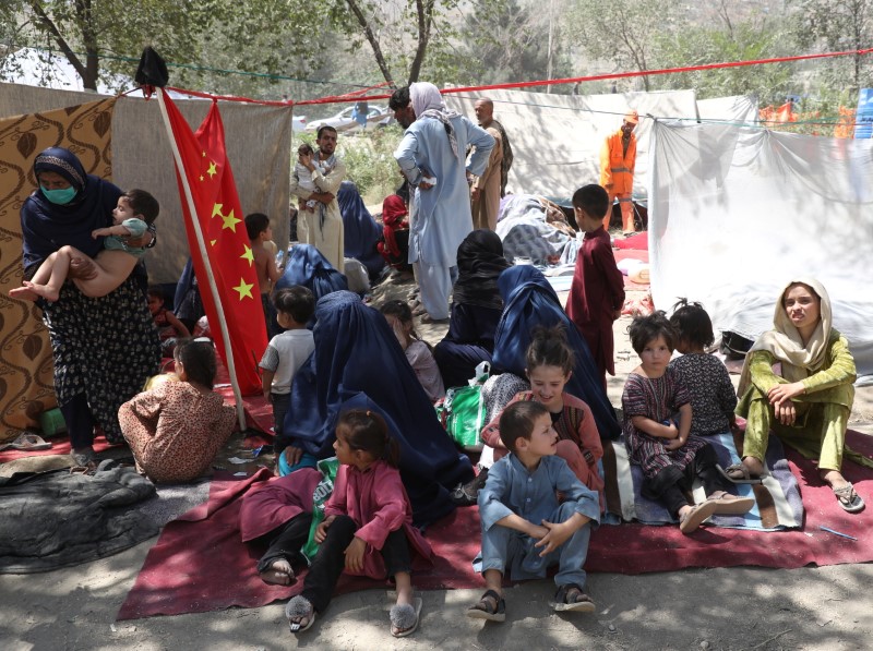Internally displaced families from northern provinces, who fled from their homes due the fighting between Taliban and Afghan security forces, take shelter in a public park in Kabul