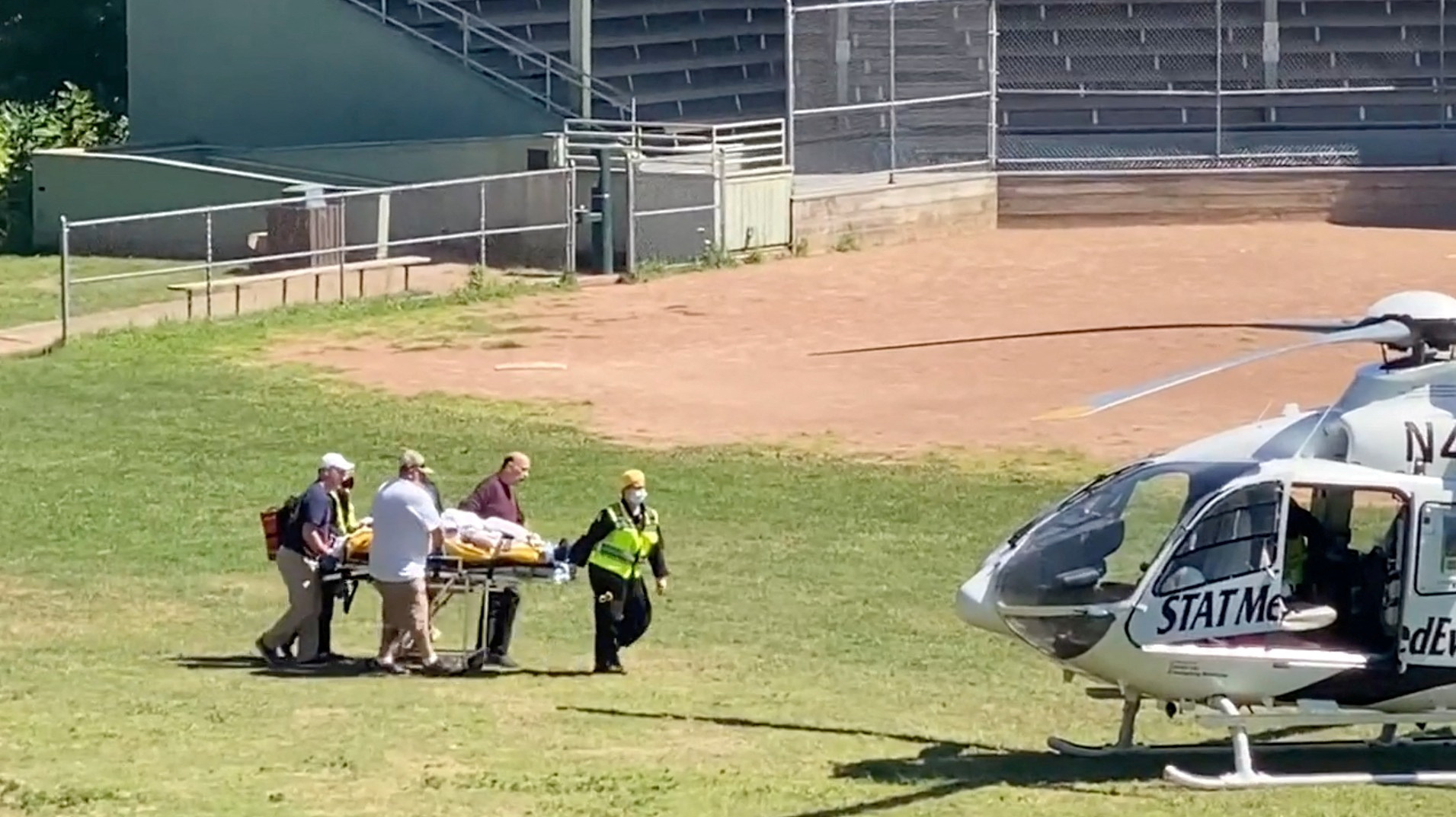 Author Salman Rushdie is transported to a helicopter after he was stabbed at the Chautauqua Institution