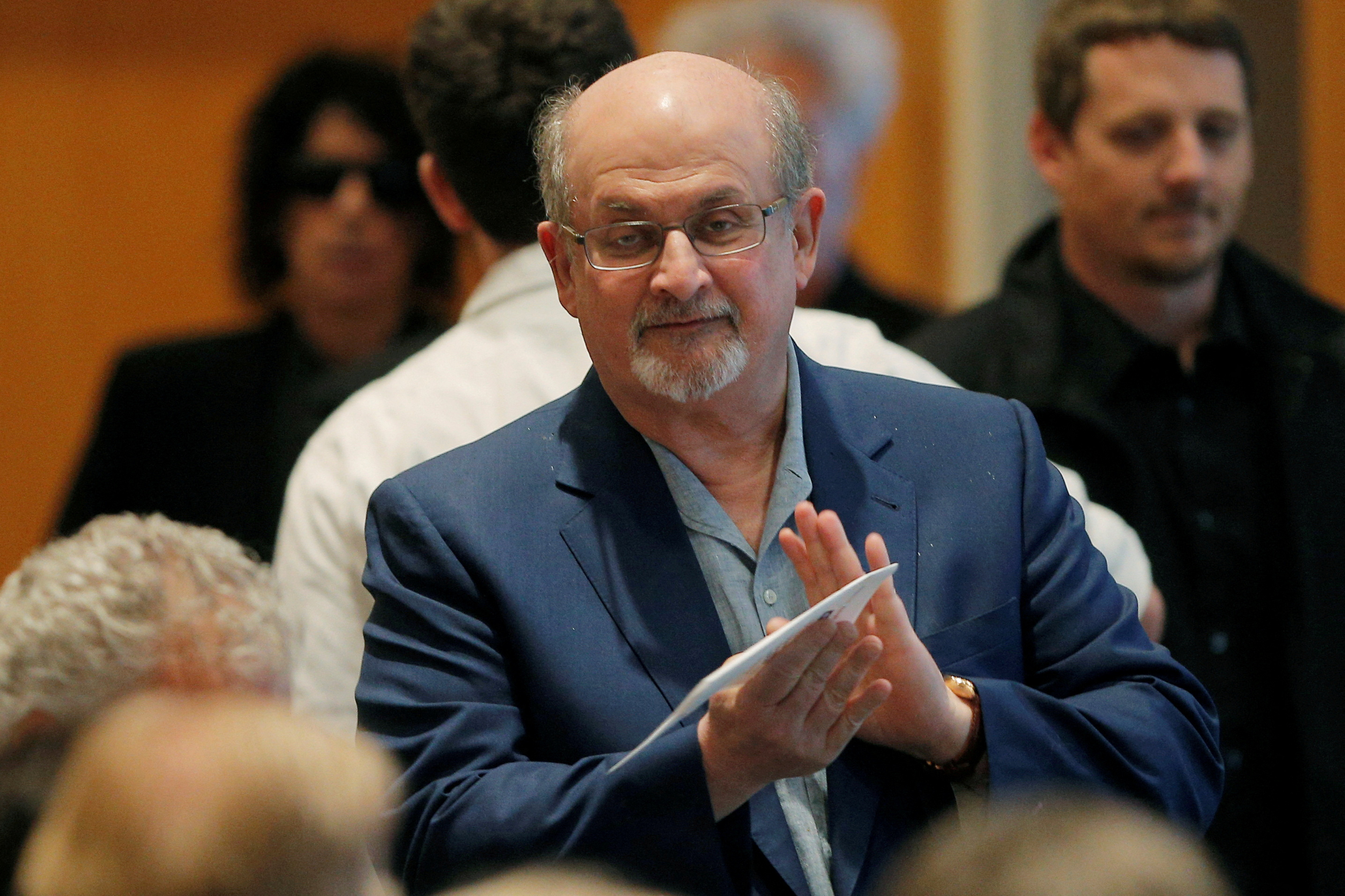 Author Salman Rushdie arrives for the PEN New England's Song Lyrics of Literary Excellence Award ceremony at the John F. Kennedy Library in Boston