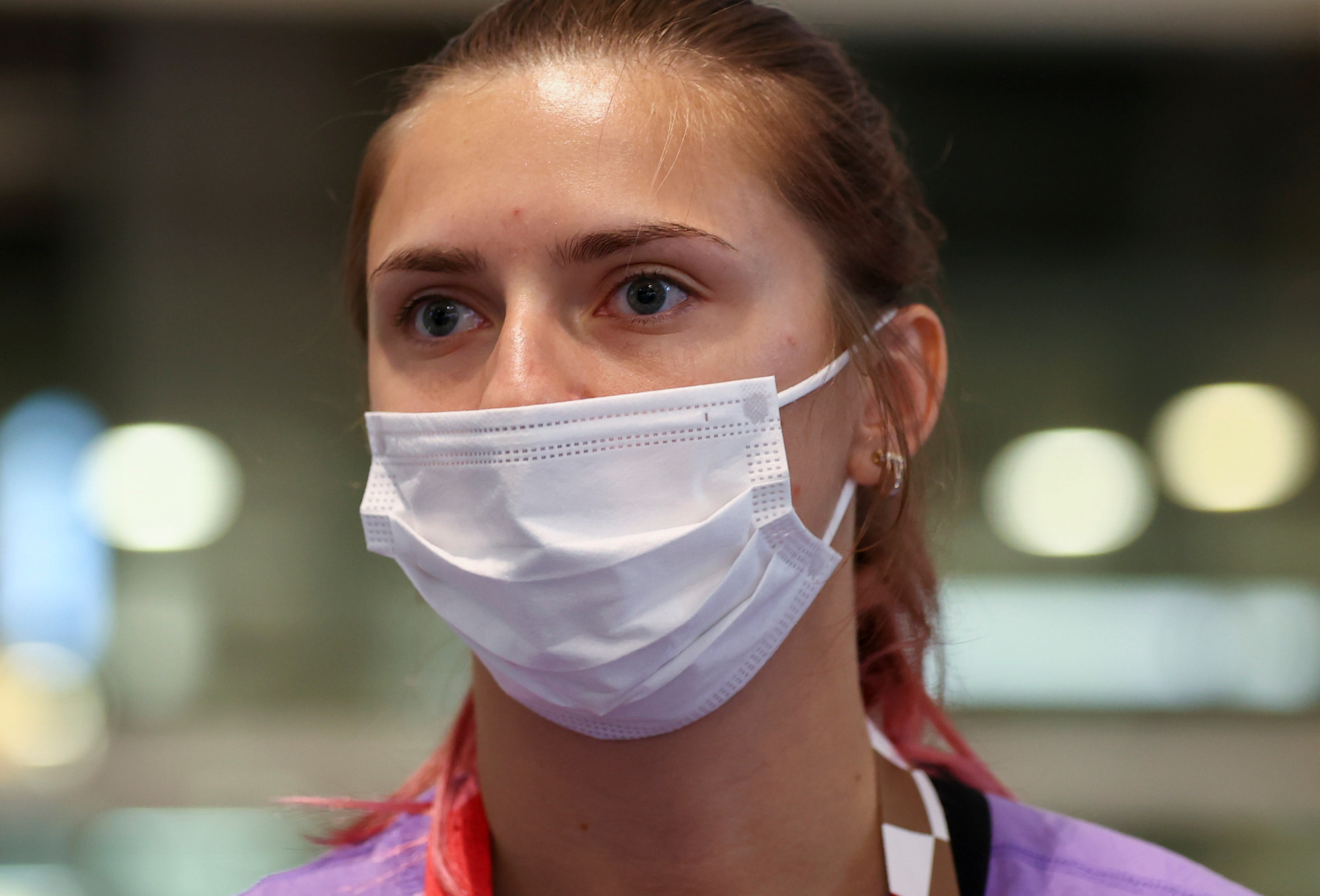 Belarusian athlete Krystsina Tsimanouskaya is seen at Haneda international airport in Tokyo