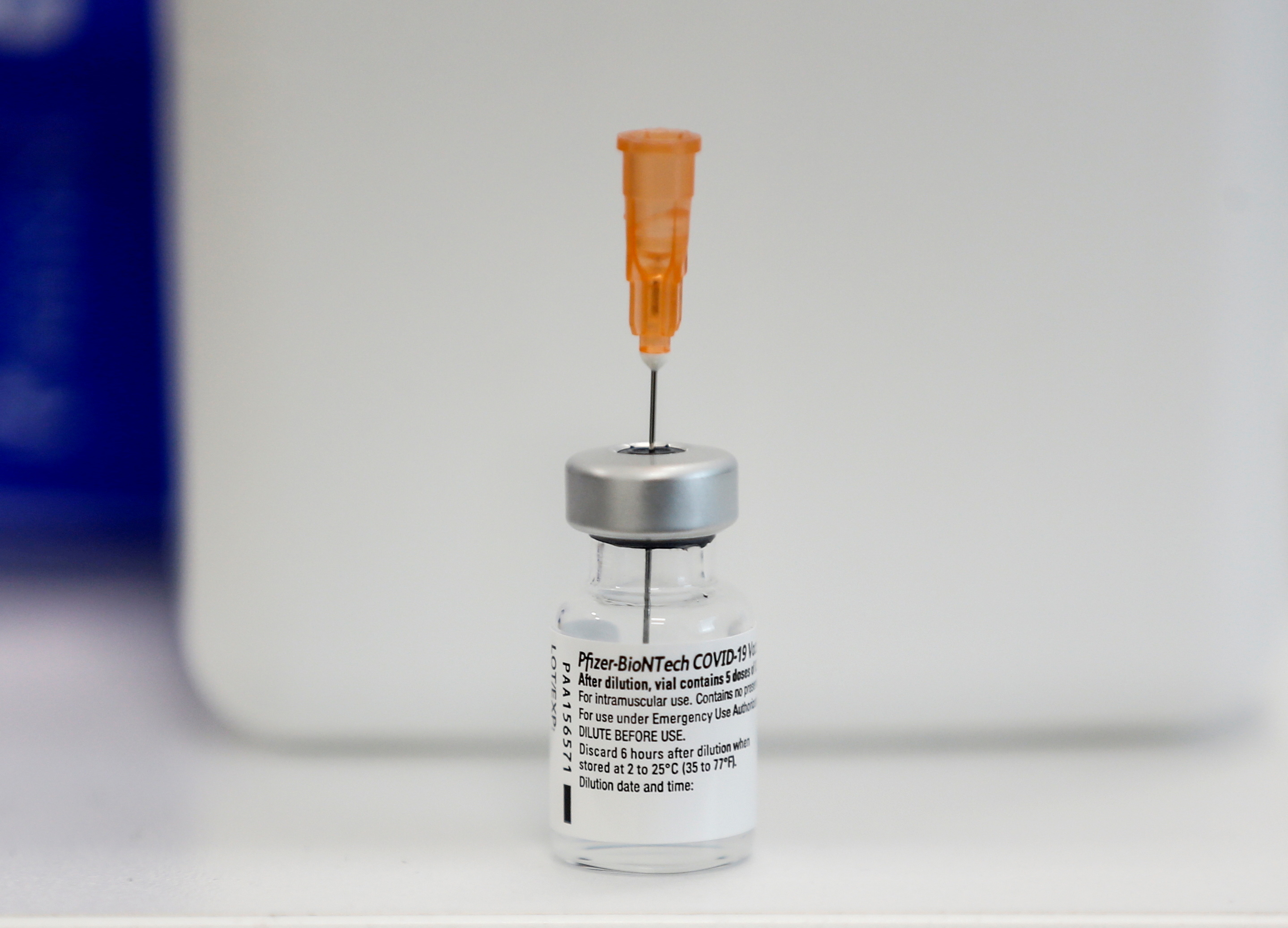 A vial of the Pfizer-BioNTech coronavirus disease (COVID-19) vaccine is seen on a table at Ankara City Hospital in Ankara