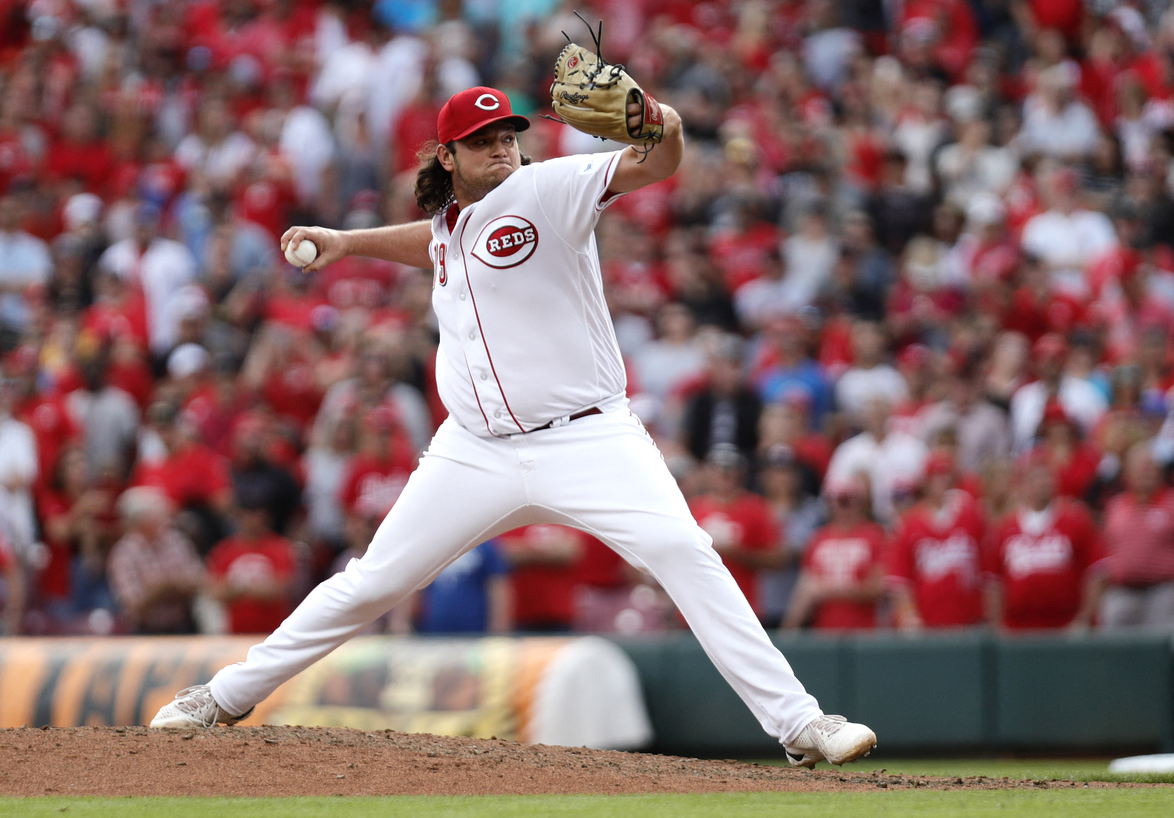 Reds rally to knock off Pirates, 4-2