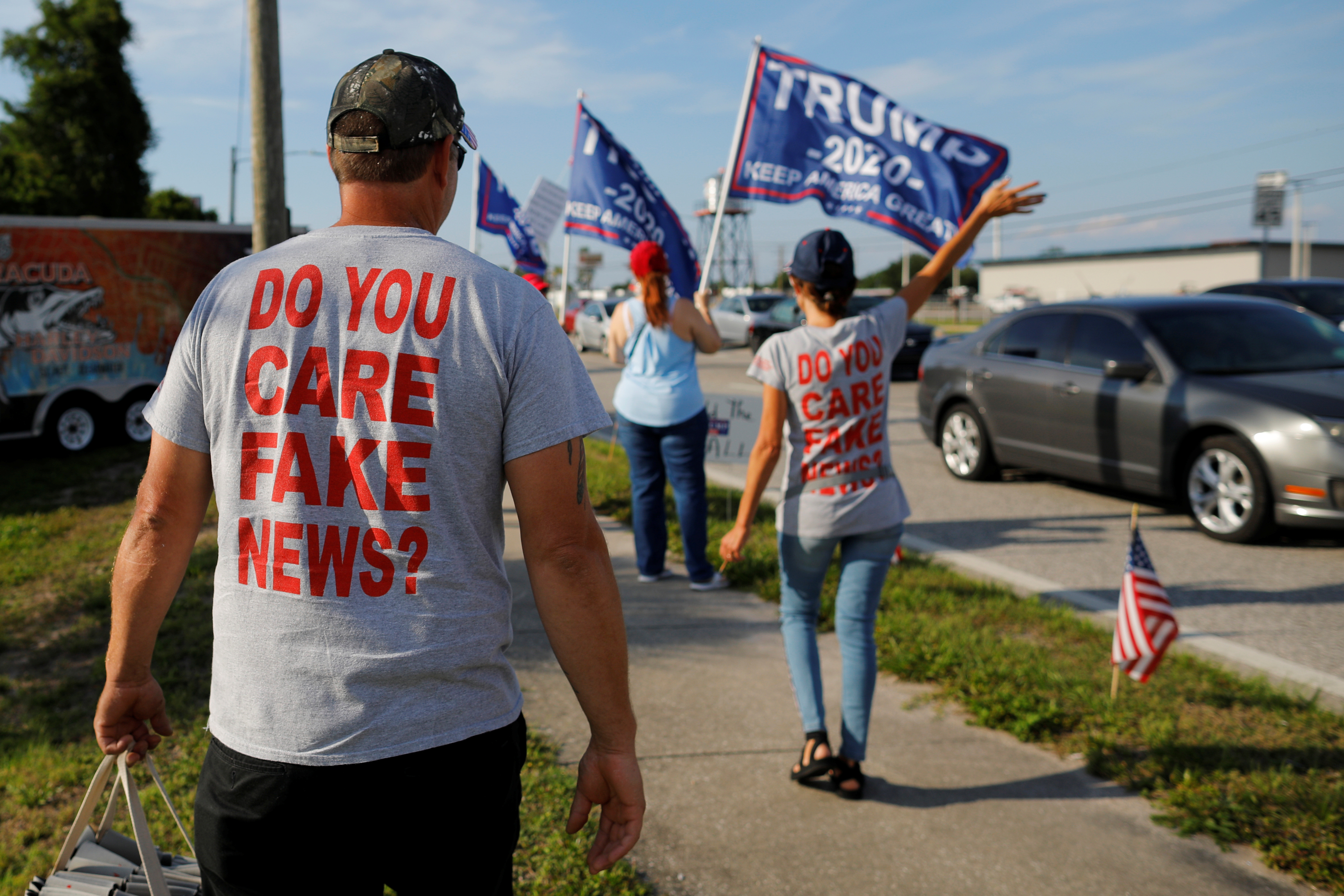 Supporters of U.S. Donald Trump hold a sign waving rally in Clearwater