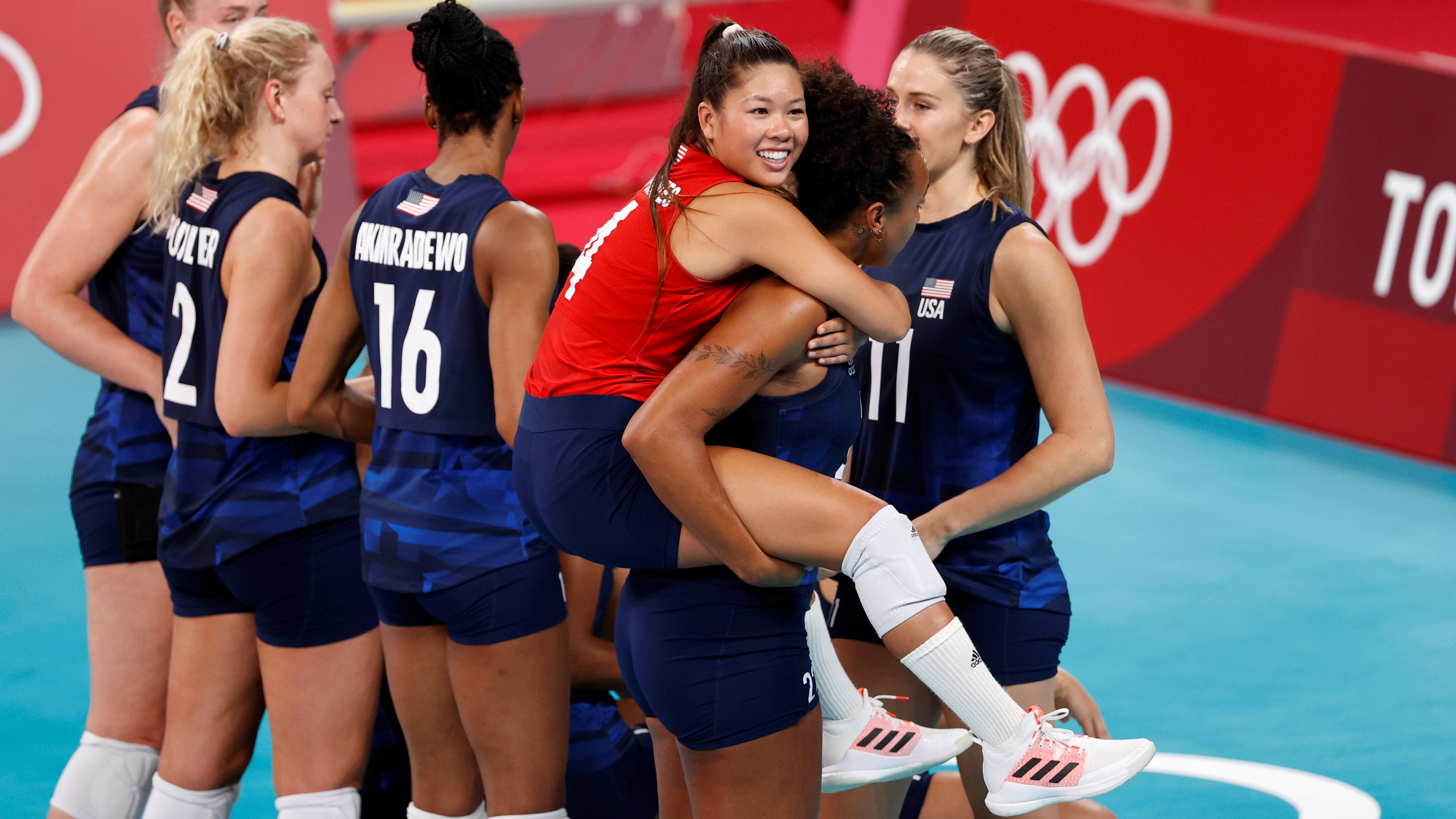 Tokyo 2020 Olympics - Volleyball - Women's Semifinal - Serbia v USA - Ariake Arena, Tokyo, Japan – August 6, 2021. Justine Wong-Orantes of the United States celebrates with teammates. REUTERS/Valentyn Ogirenko