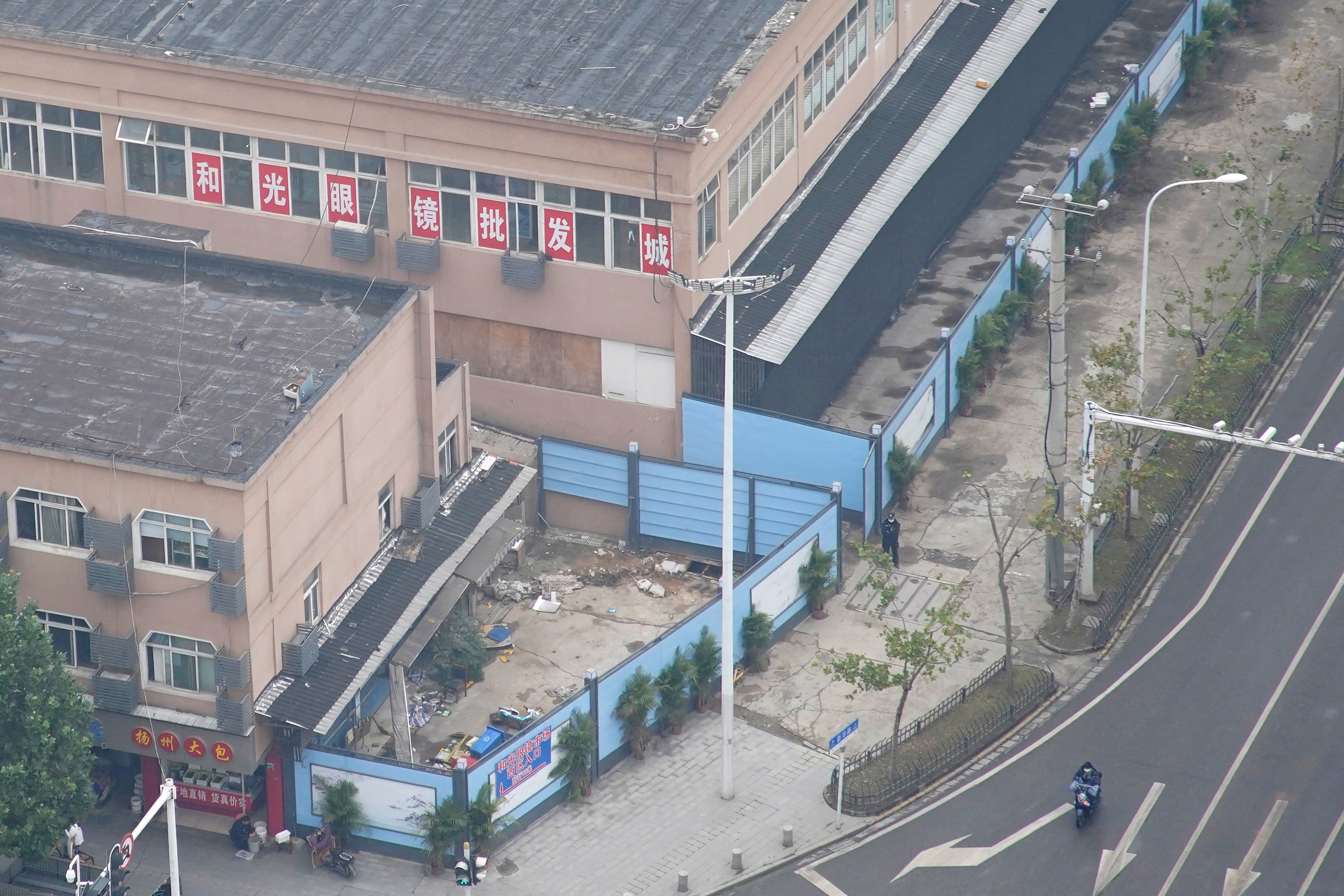 The building of Huanan seafood market, where the second floor remains open for optics stores, and where coronavirus believed to have first surfaced, almost a year after the start of the coronavirus disease (COVID-19) outbreak, in Wuhan