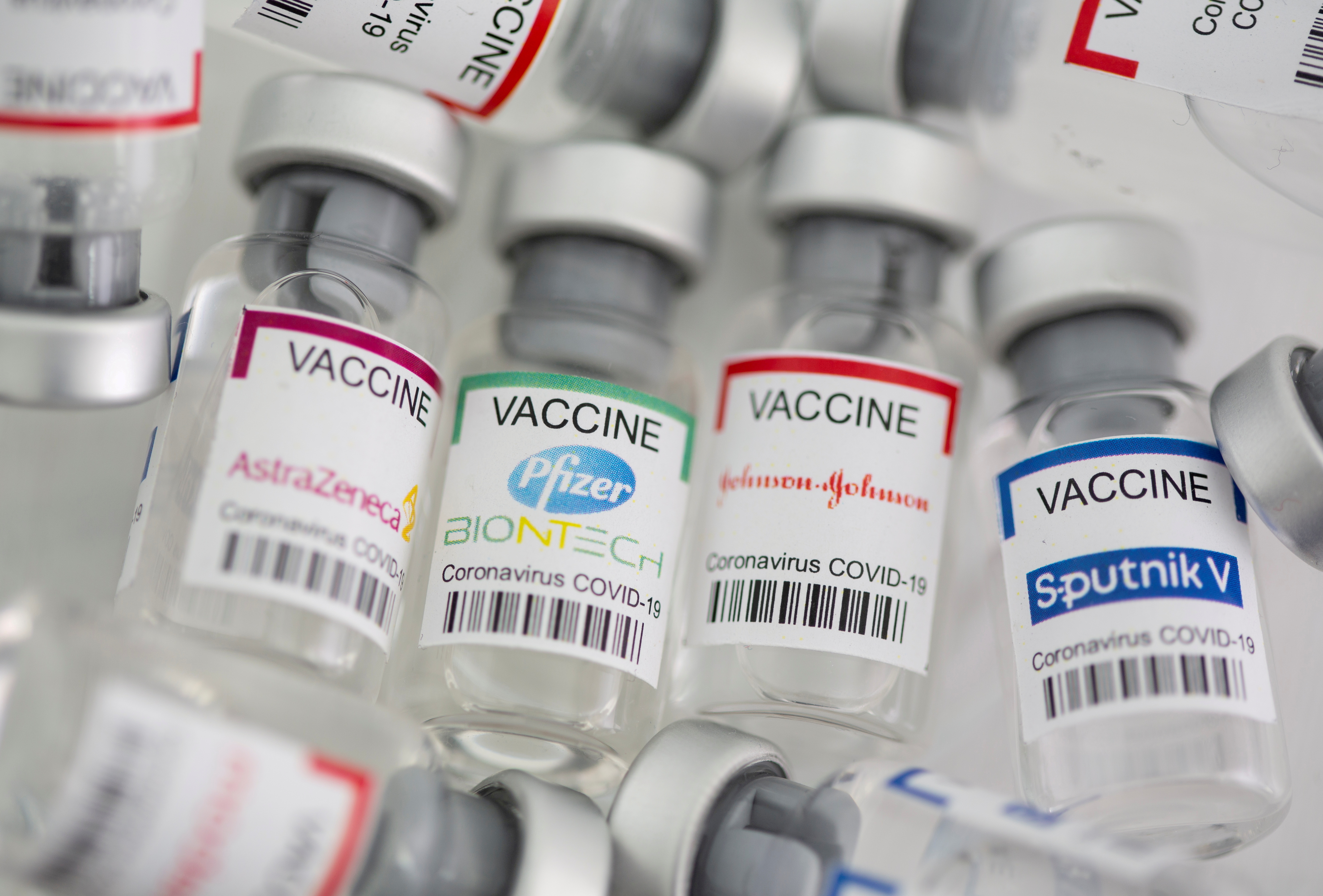 Vials labelled "AstraZeneca, Pfizer - Biontech, Johnson&Johnson, Sputnik V coronavirus disease (COVID-19) vaccine" are seen in this illustration picture