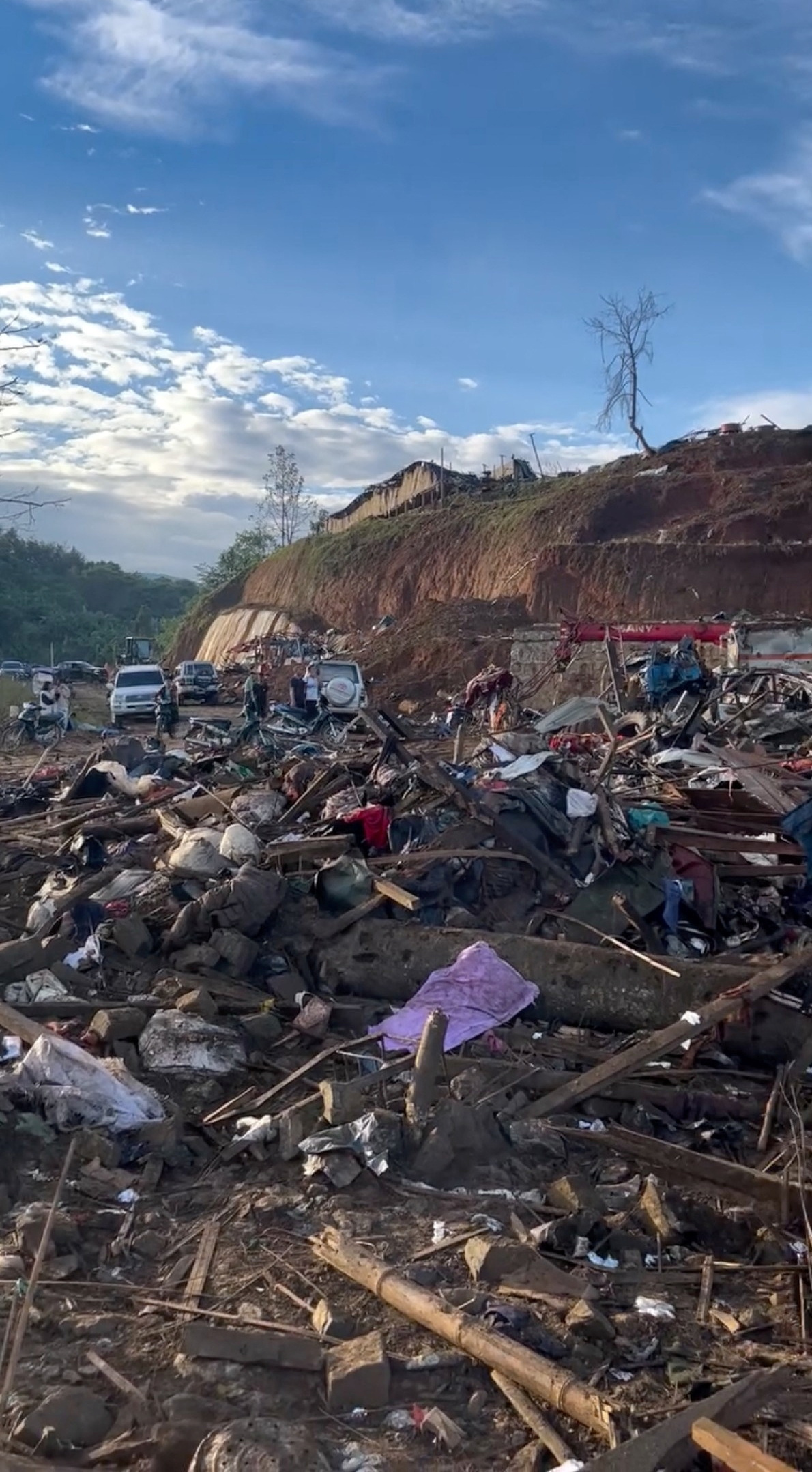 Debris in a refugee camp after women and children were killed in Myanmar