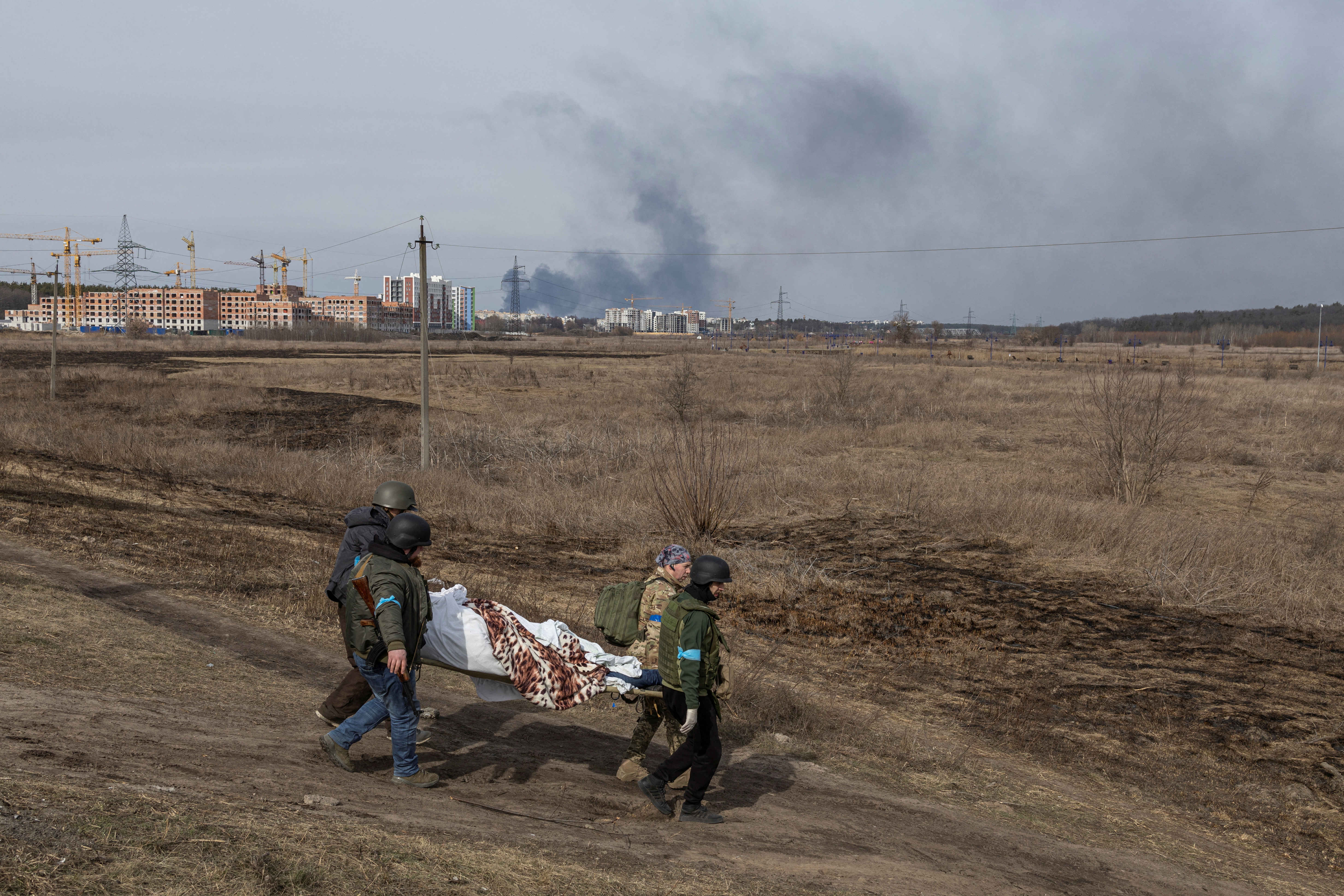People fleeing the town of Irpin outside of Kyiv