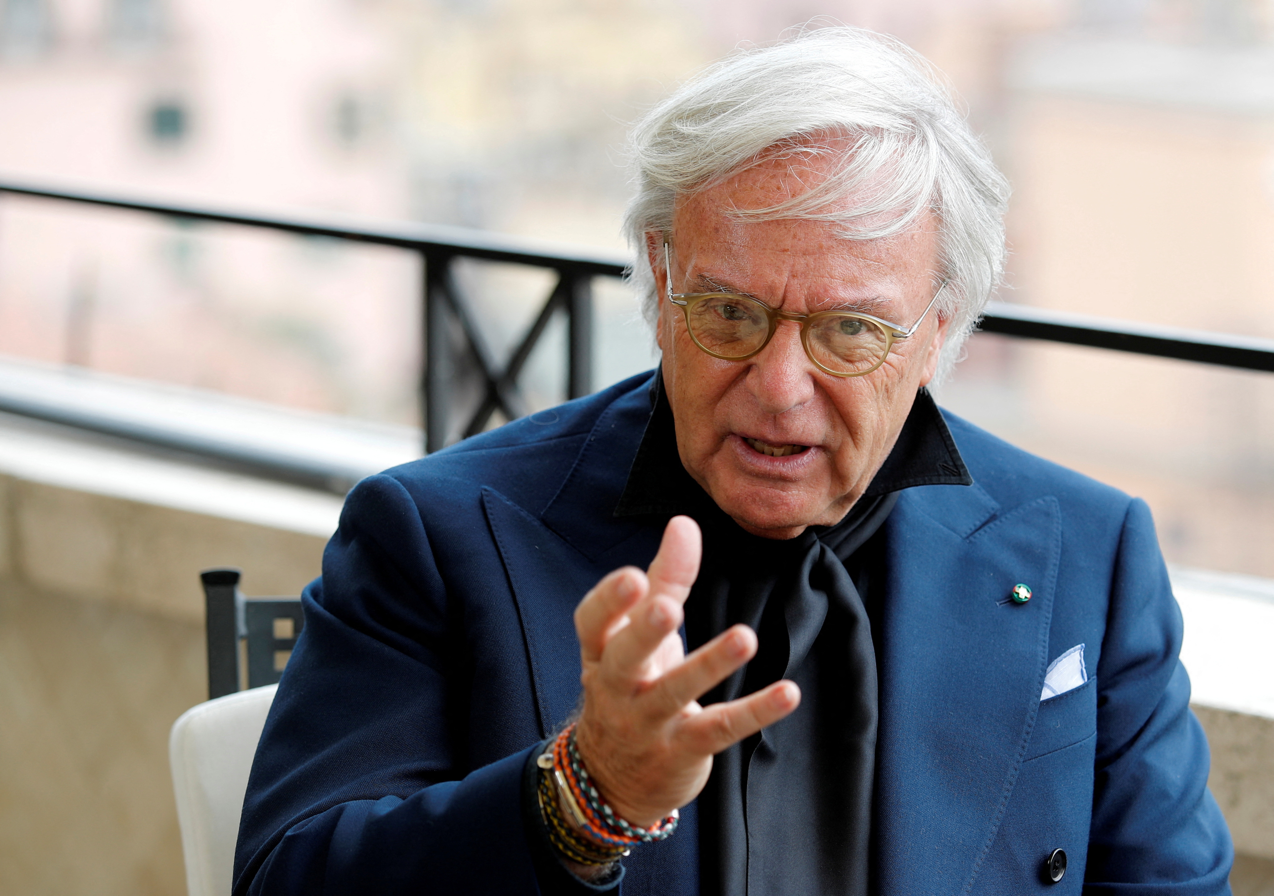 Tod's Chairman Della Valle gestures during an interview in Rome