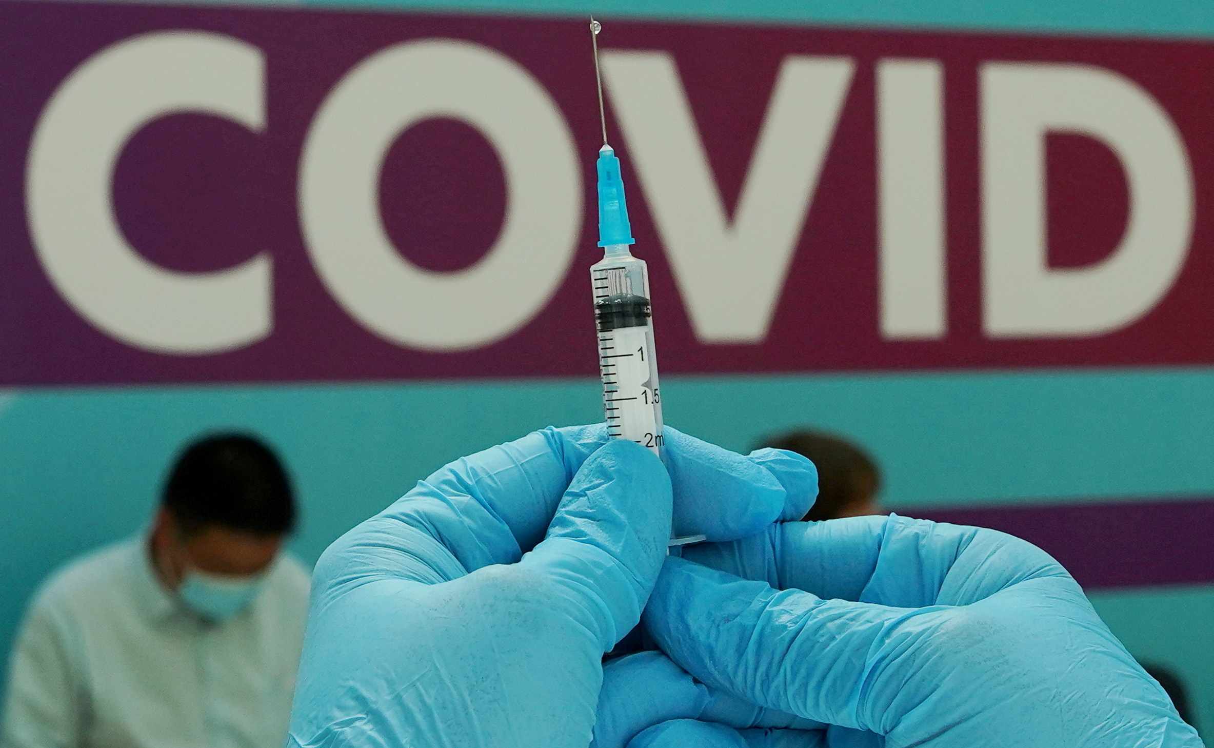 A healthcare worker prepares a dose of Sputnik V (Gam-COVID-Vac) vaccine against the coronavirus disease (COVID-19) at a vaccination centre in Gostiny Dvor in Moscow, Russia July 6, 2021. REUTERS/Tatyana Makeyeva/File Photo