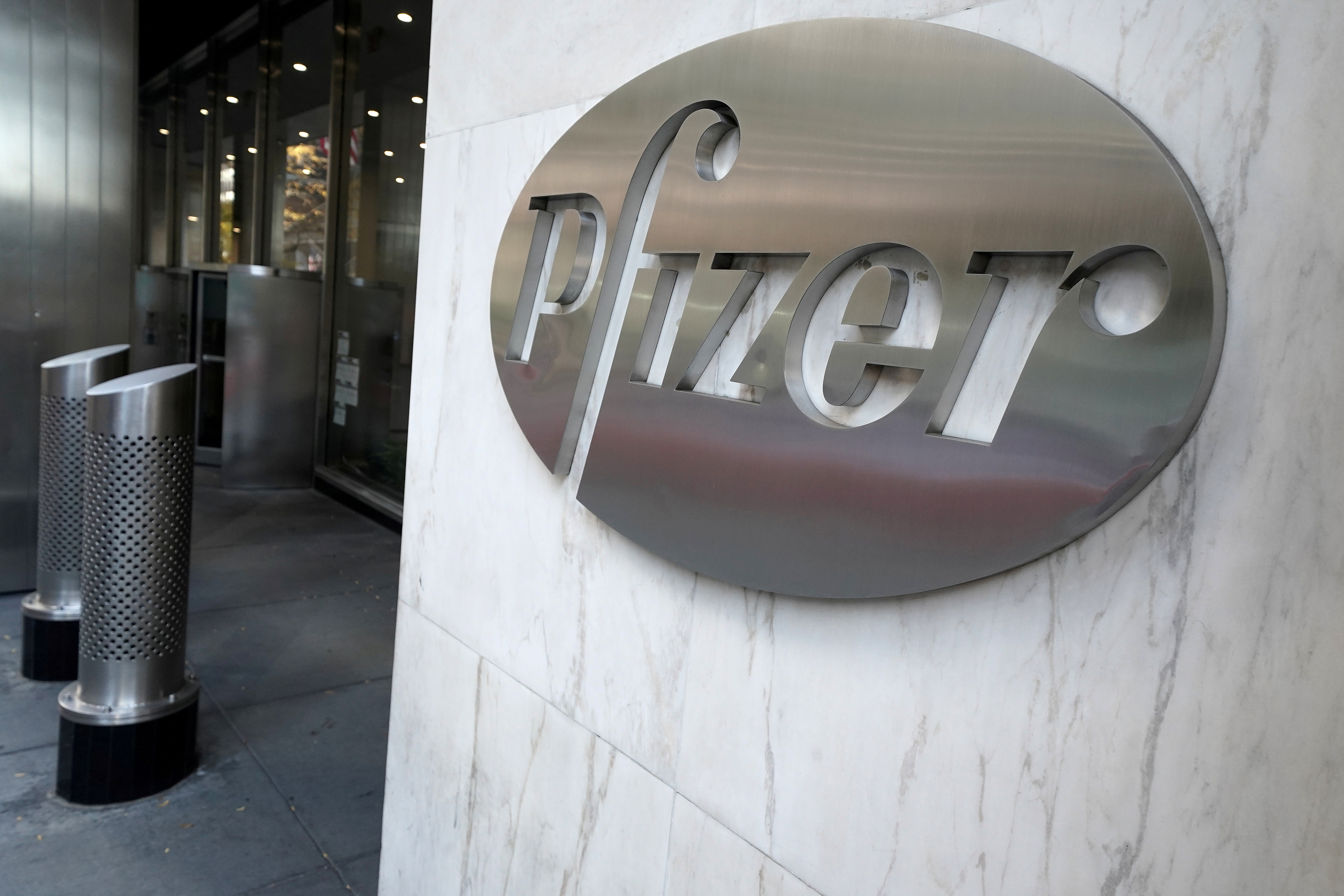 The Pfizer logo is pictured on their headquarters building in the Manhattan borough of New York City, New York, U.S., November 9, 2020. REUTERS/Carlo Allegri