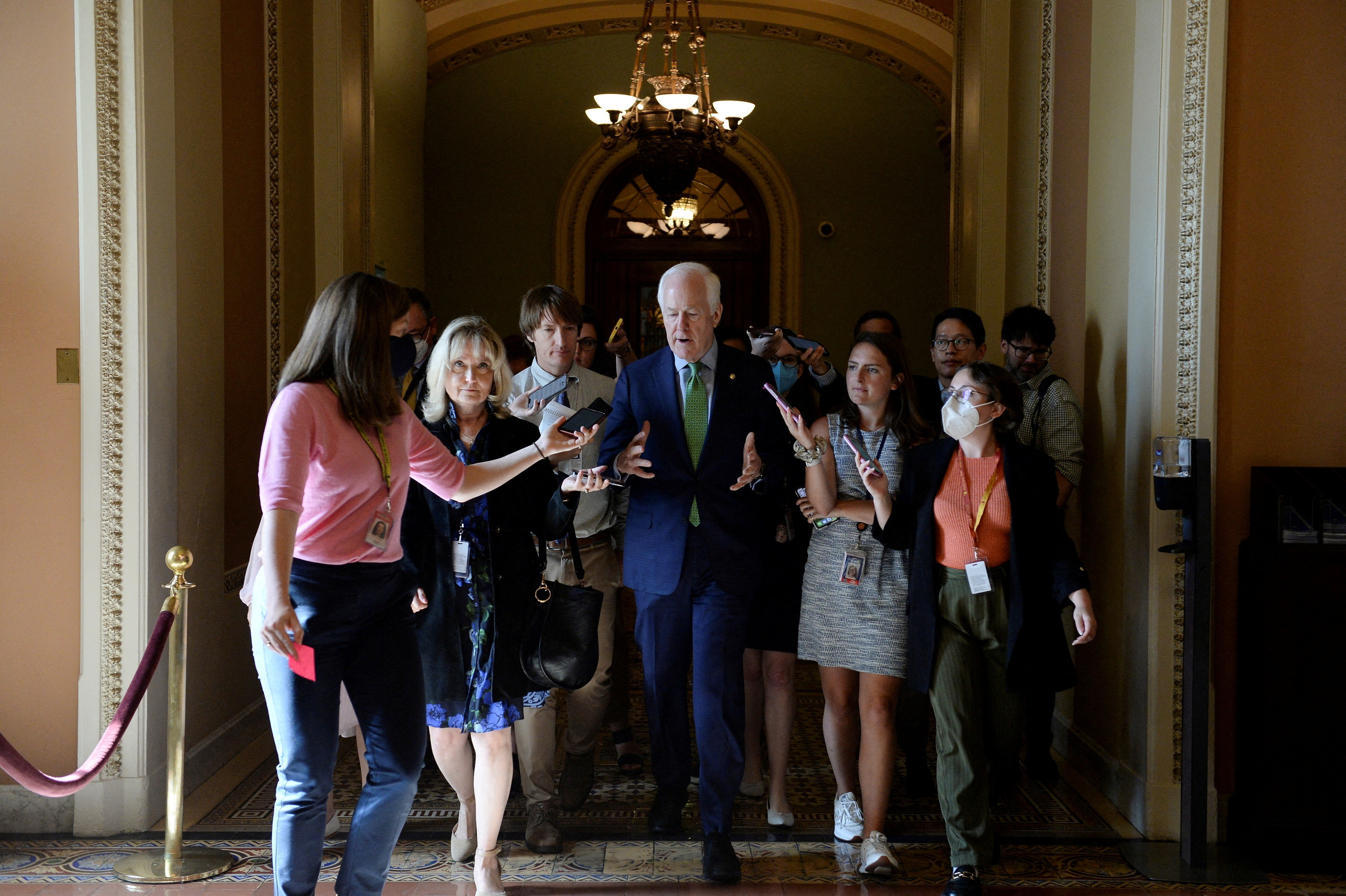 U.S. Sen. John Cornyn (R-TX) is questioned by reporters at the U.S. Capitol