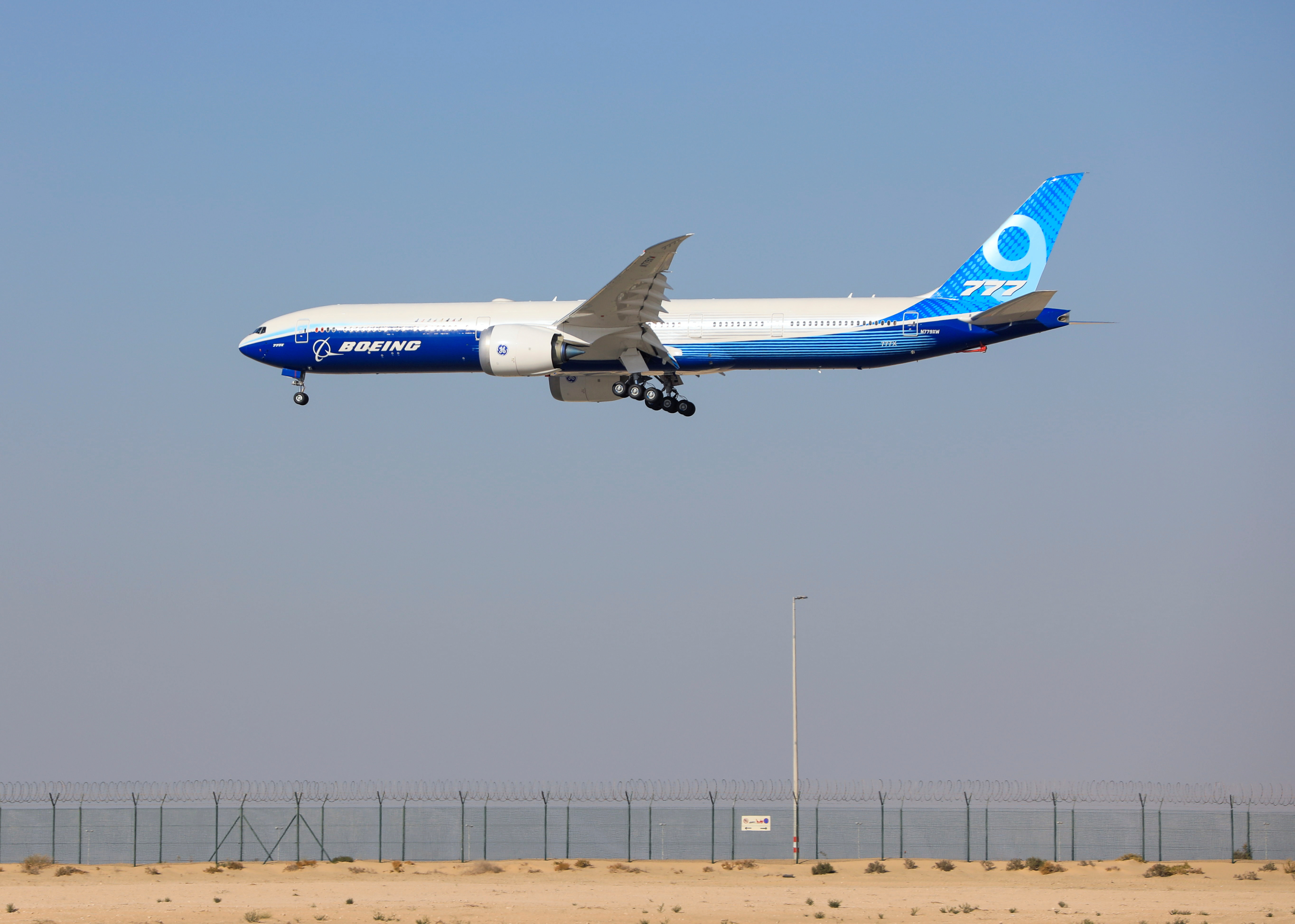 A Plane Boeing 777X performs during the Dubai Airshow, in Dubai