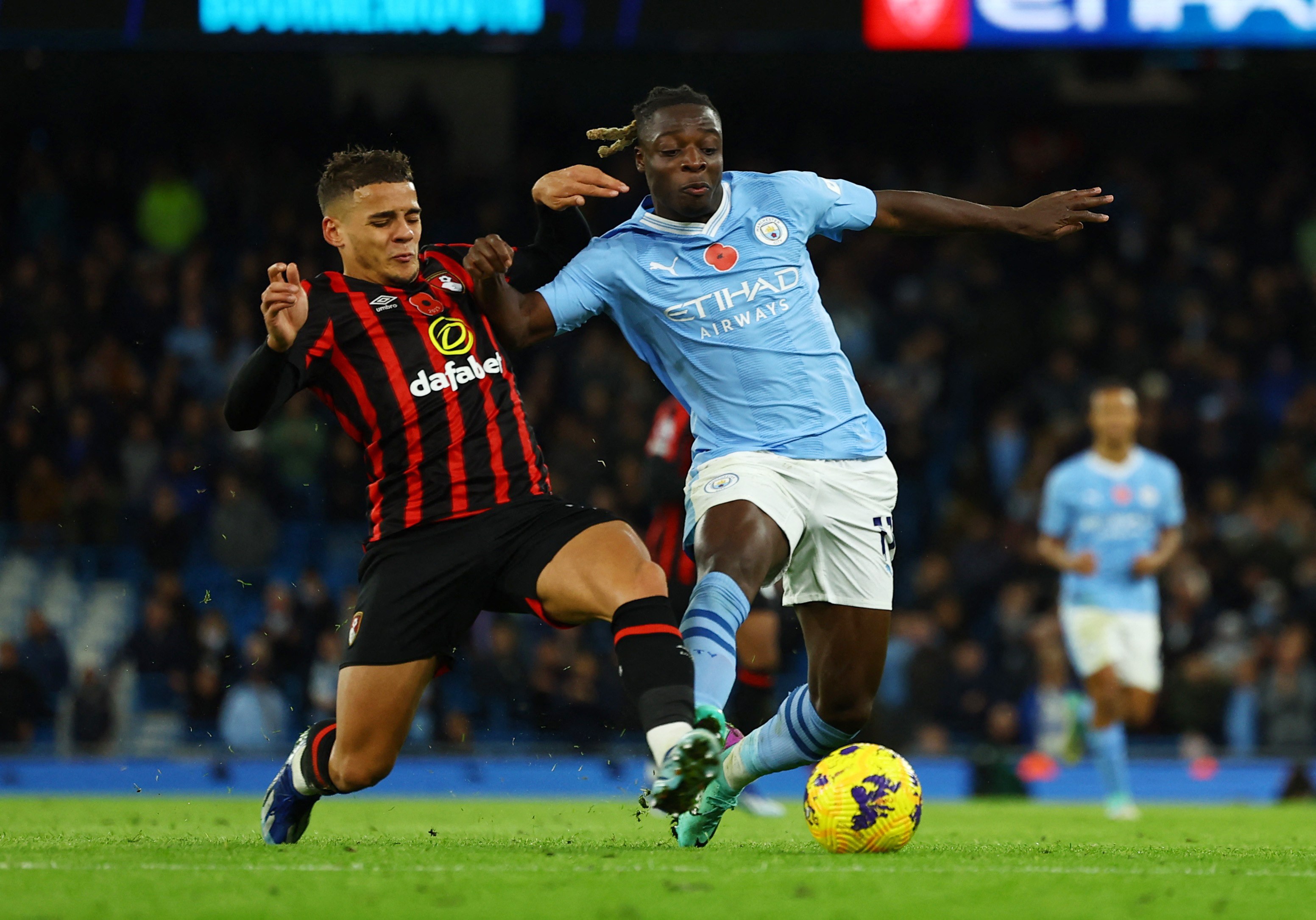 Manchester City's Manuel Akanji heads the ball during the