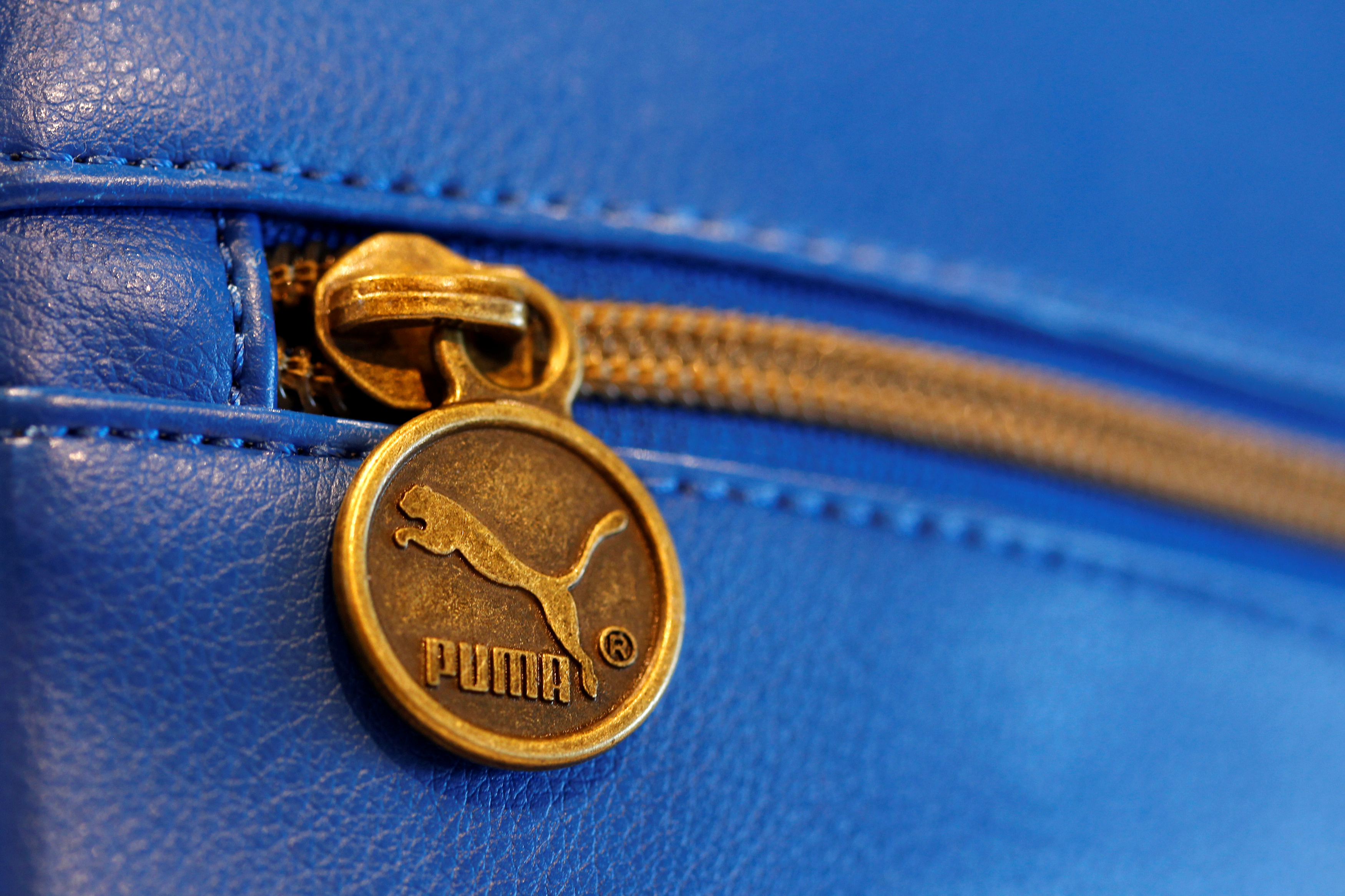 A Puma handbag is pictured in a shop after the company's annual news conference in Herzogenaurach