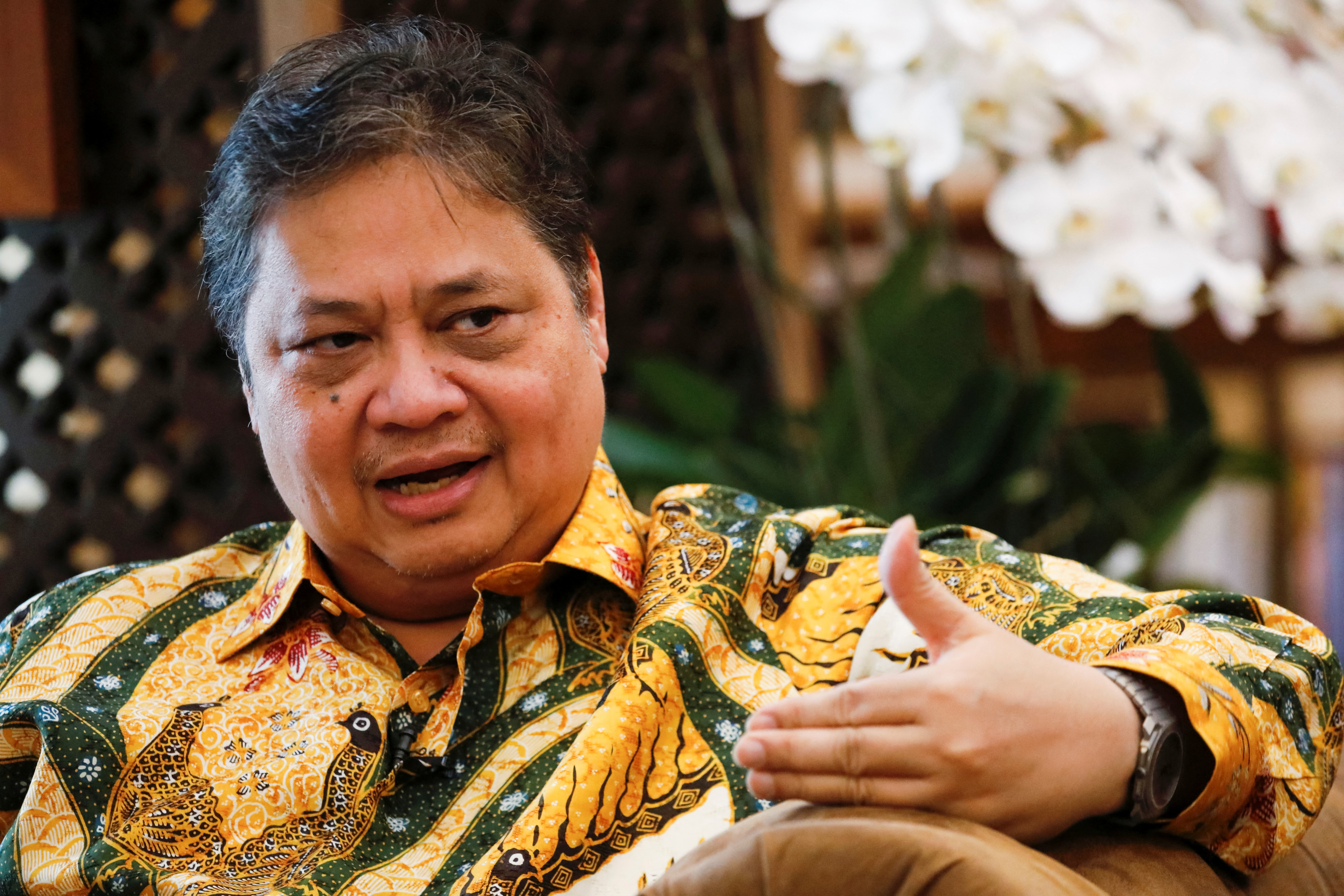 Airlangga Hartarto, Indonesia's Coordinating Minister for Economic Affairs, gestures as he talks during an interview with Reuters at his office in Jakarta,