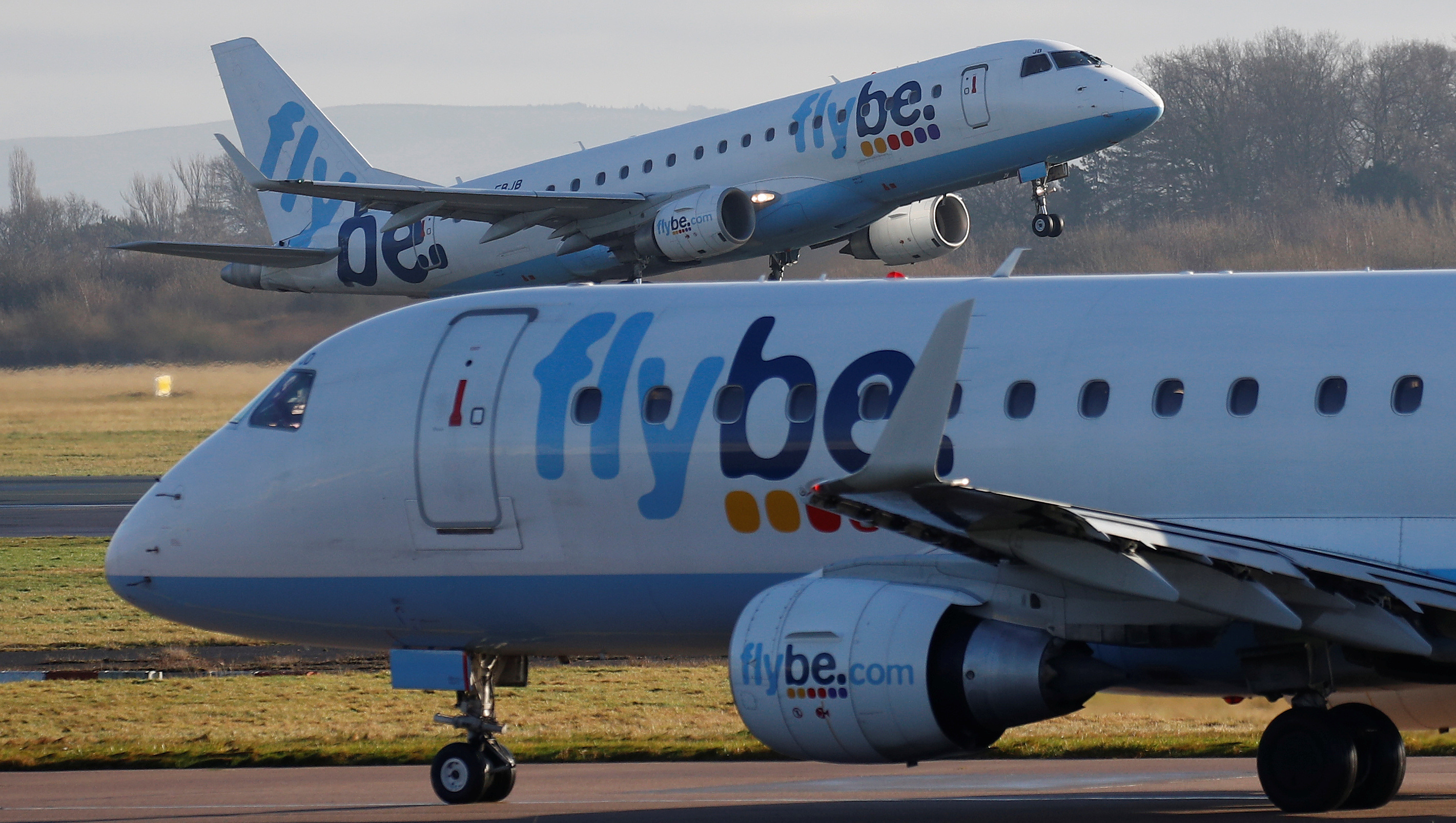 A Flybe plane takes off from Manchester Airport in Manchester