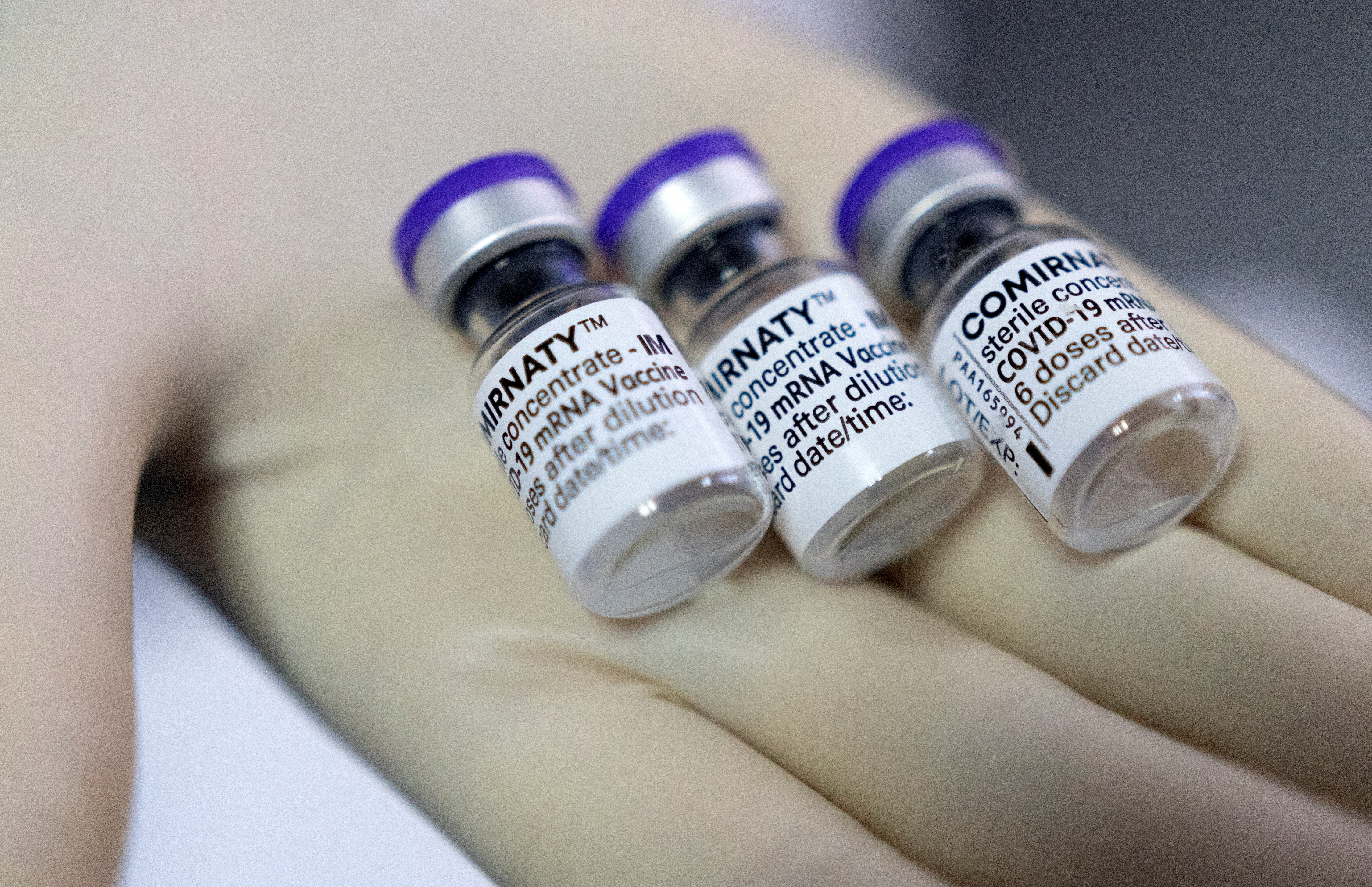 A doctor shows vials of Biontech-Pfizer's Comirnaty vaccine against COVID-19 at the Institute for Health and Food Safety of Zenica