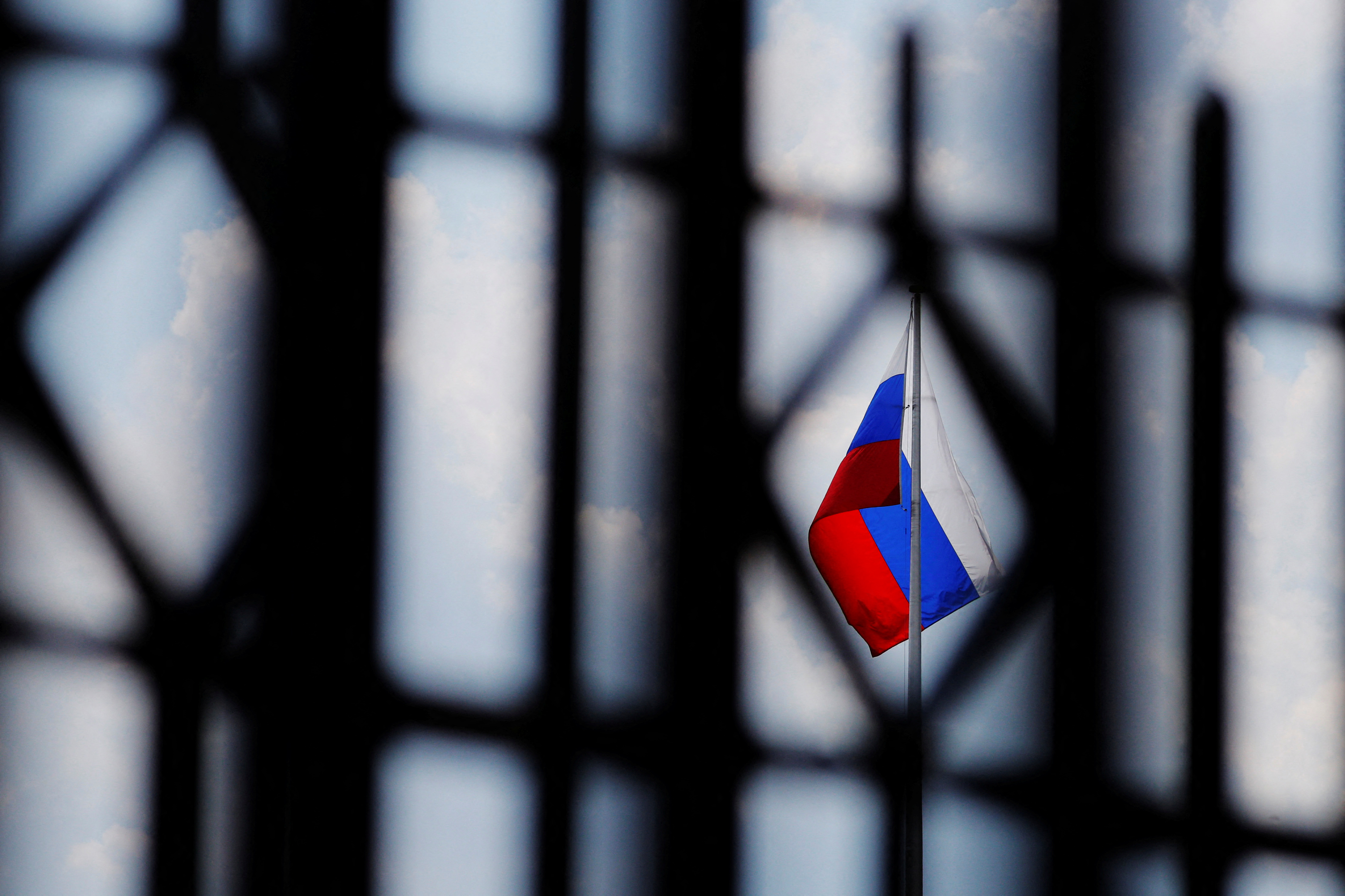 The Russian flag flies over the Embassy of Russia in Washington