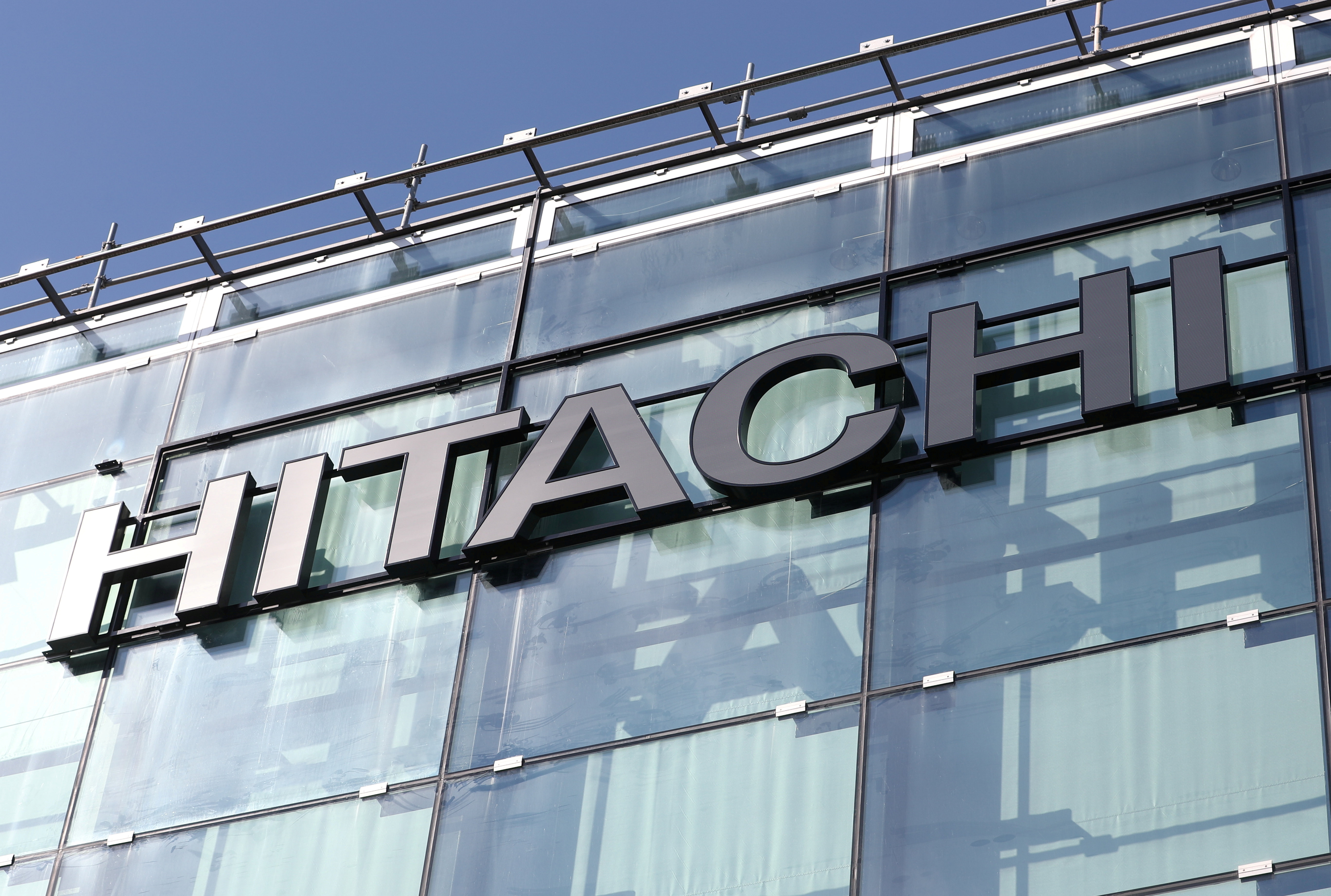 The logo of Hitachi is seen at an office building in Zurich, Switzerland September 10, 2020.  REUTERS/Arnd Wiegmann/File Photo  