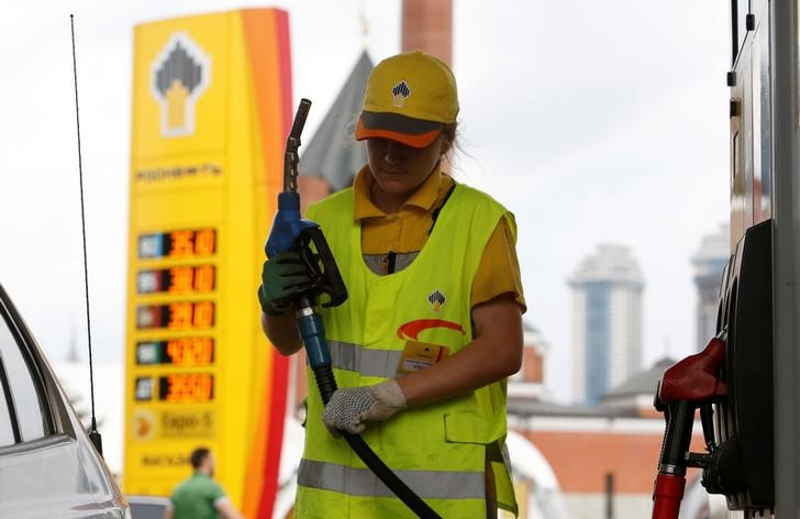 Employee works at Rosneft petrol station in Moscow