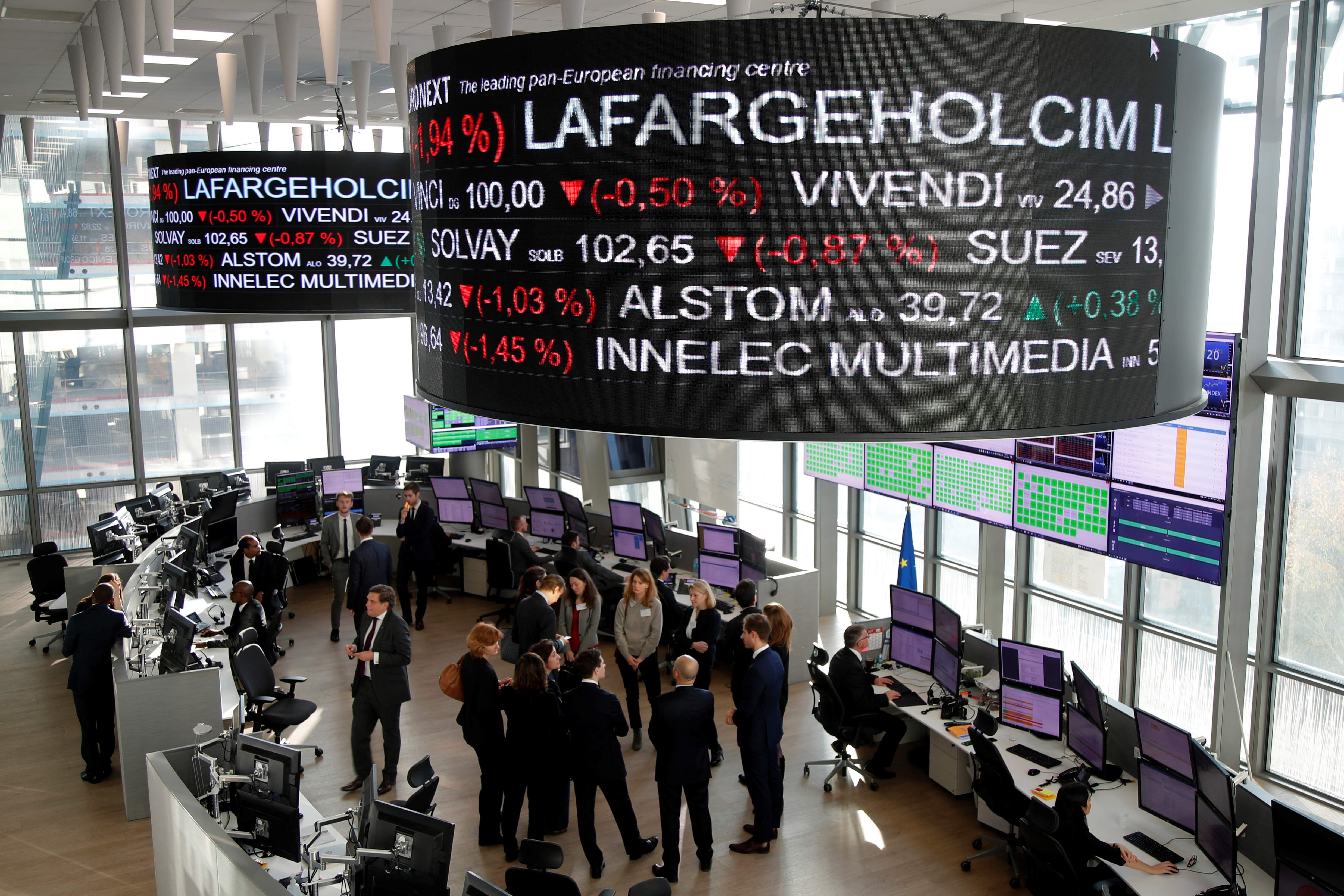 Stock market operators work at the Euronext headquarters at La Defense business and financial district in Courbevoie near Paris