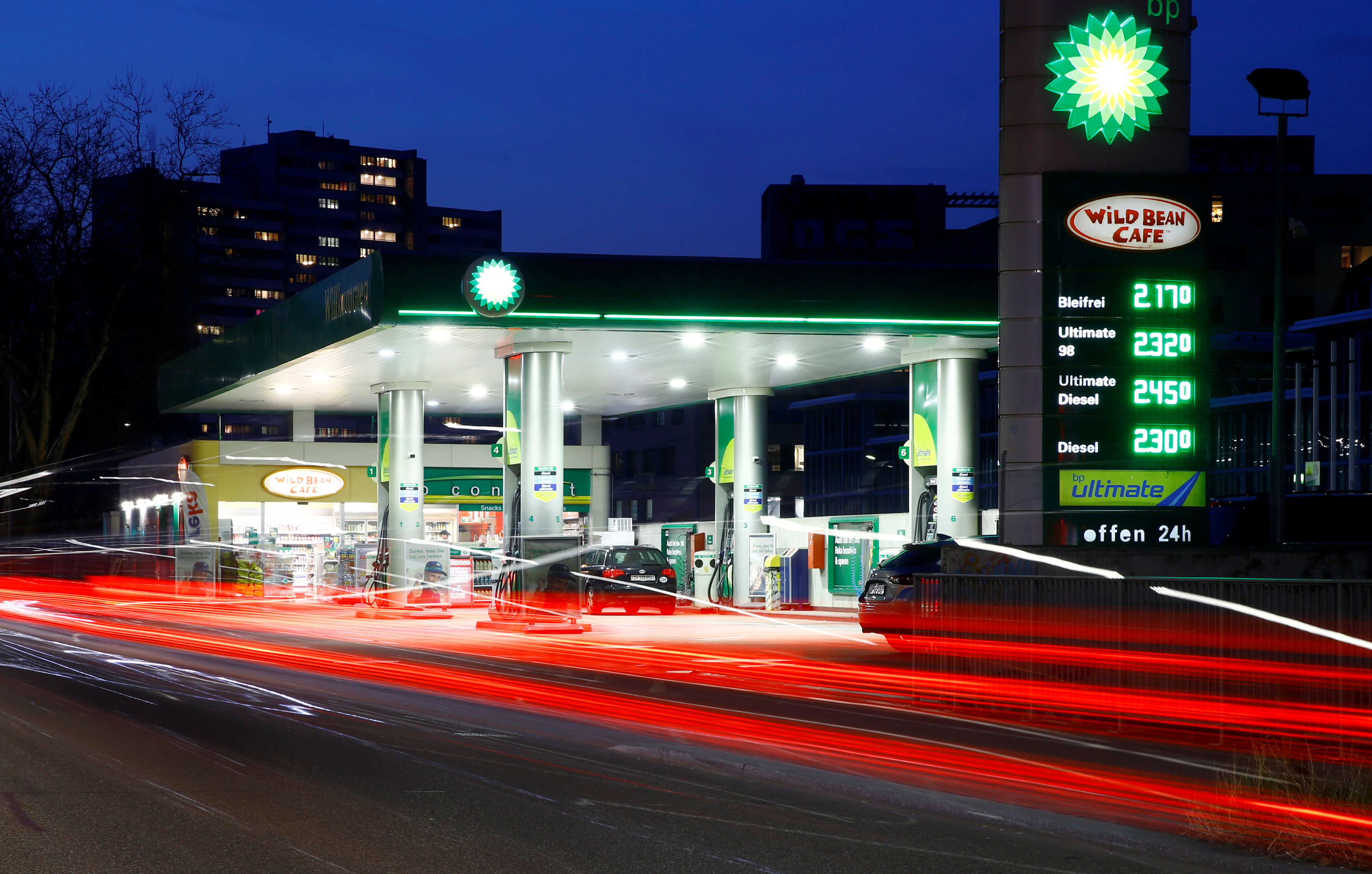 A display shows fuel prices at a BP gas station in Zurich