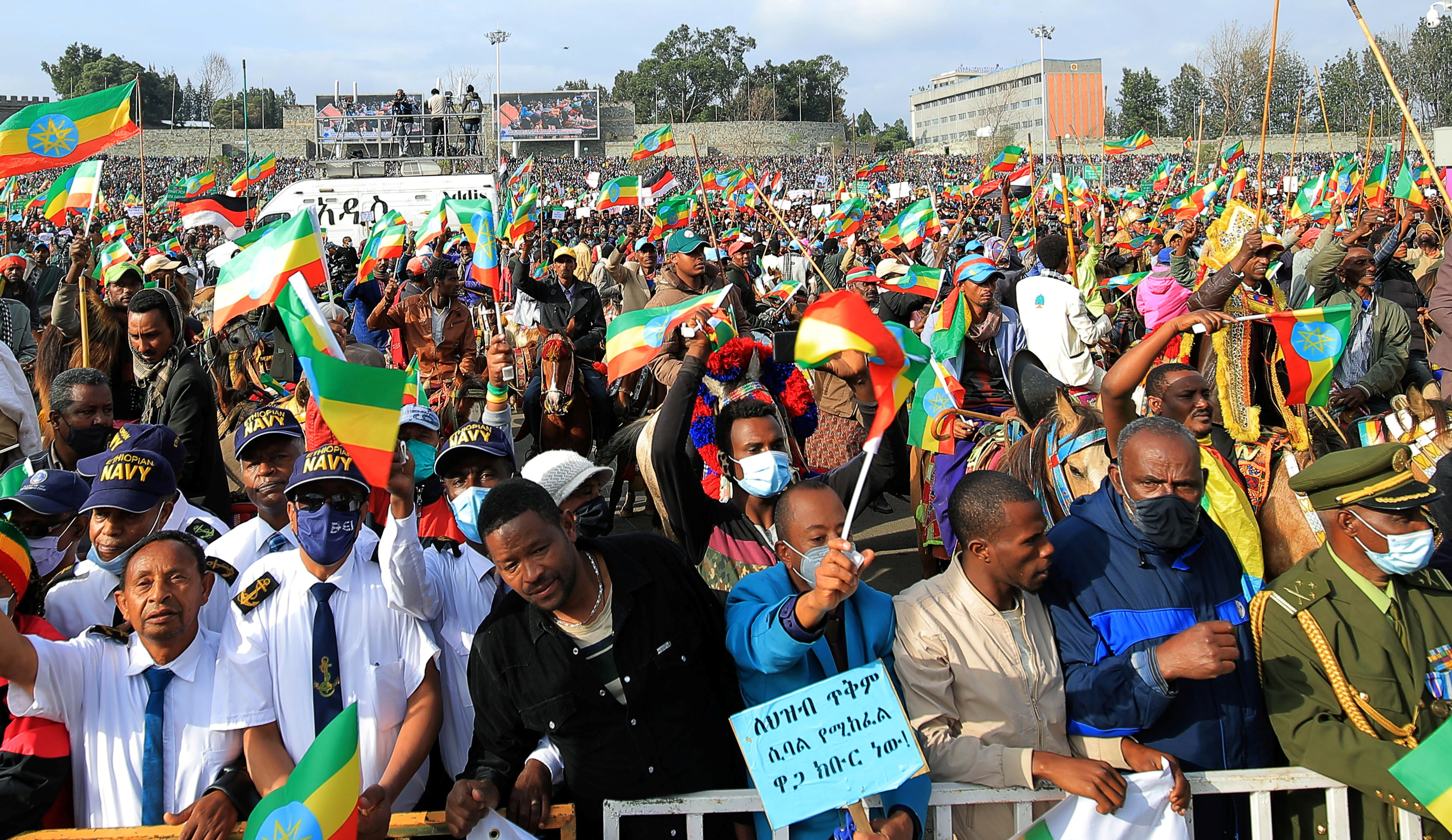 People attend a rally to support the National Defense Force at the Meskel Square in Addis Ababa