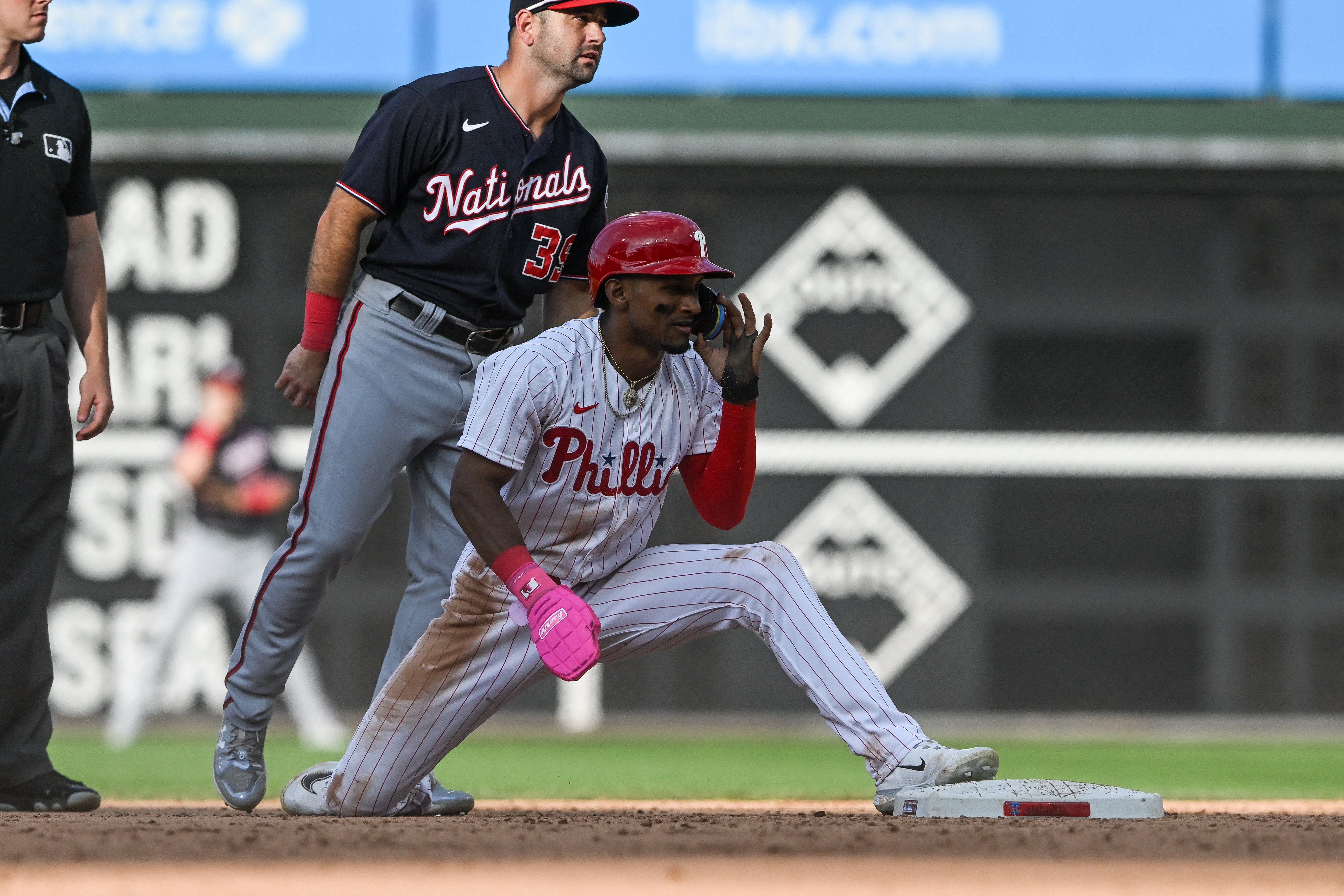 Joey Meneses homers twice as Nats split with Phillies