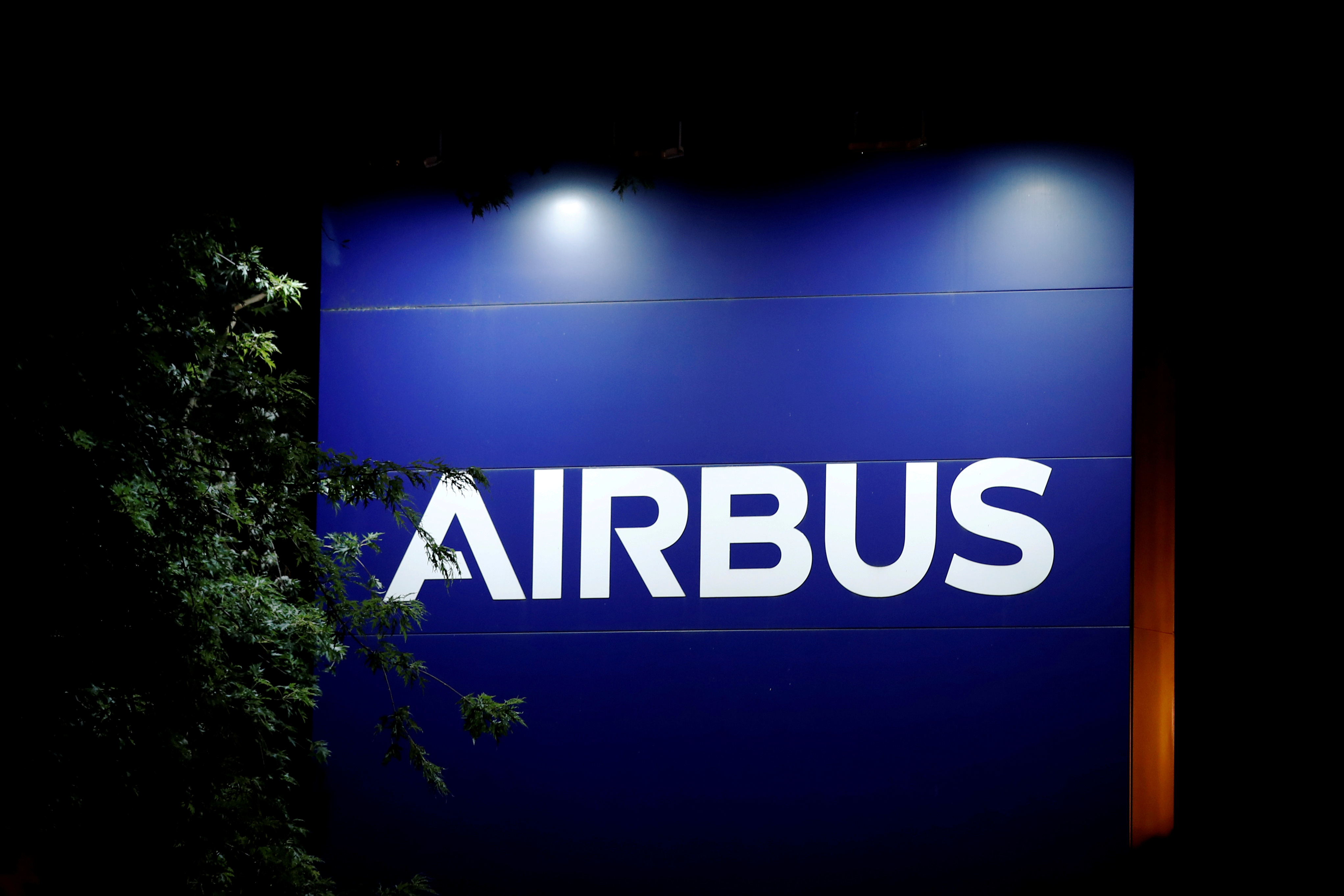 A logo of Airbus is seen at the entrance of its factory in Blagnac near Toulouse, France, July 2, 2020. REUTERS/Benoit Tessier/File Photo