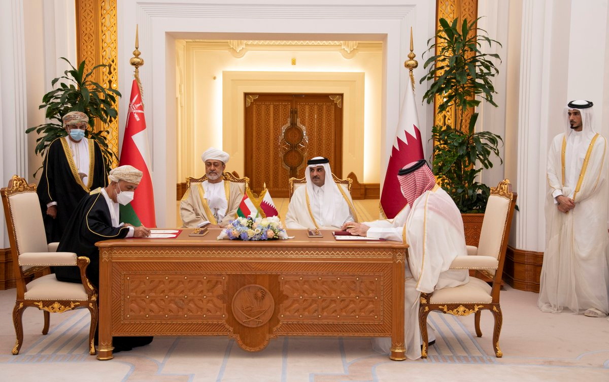 Qatar's Emir Sheikh Tamim bin Hamad al-Thani and Oman's Sultan Haitham bin Tariq witness the signing of agreements between the two countries in Doha