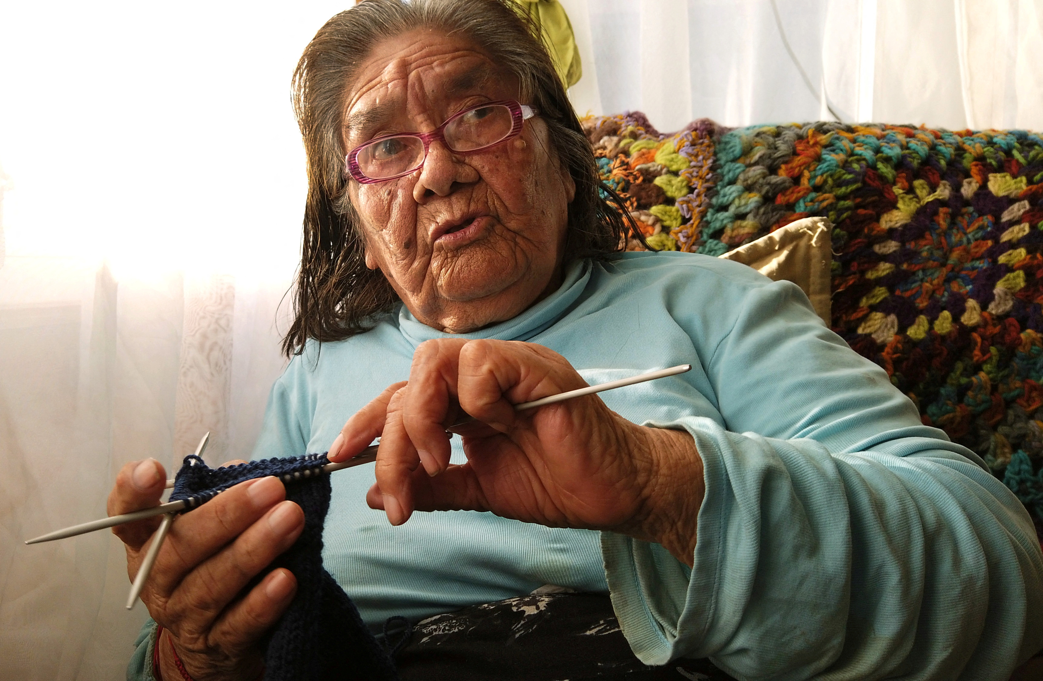 The last woman from a tribe Yagan and speaker of this language, Cristina Calderon, 91, speaks during an interview with Reuters at her house in Ukika village
