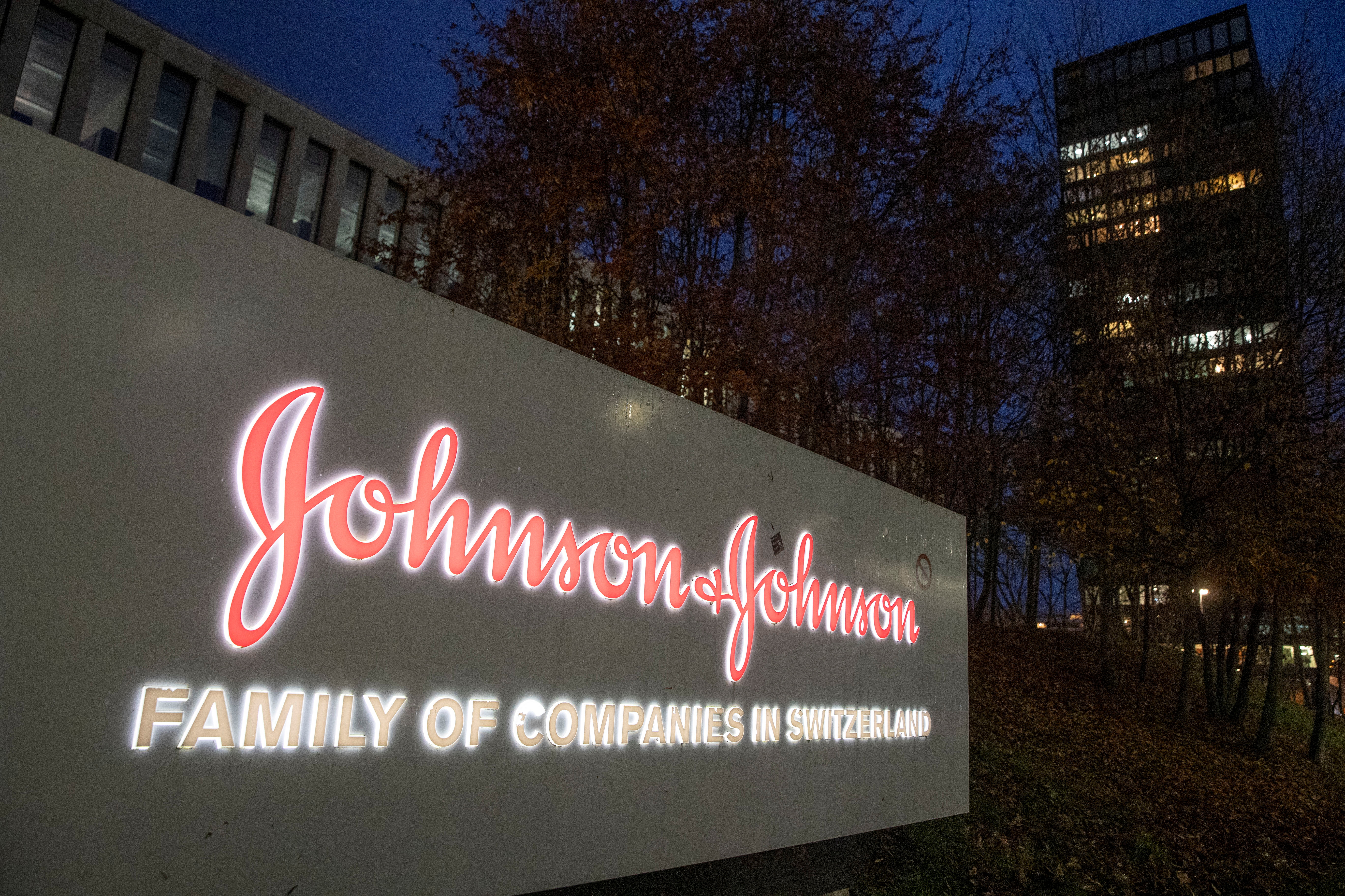 The logo of healthcare company Johnson & Johnson is seen in front of an office building in Zug, Switzerland. REUTERS/Arnd Wiegmann