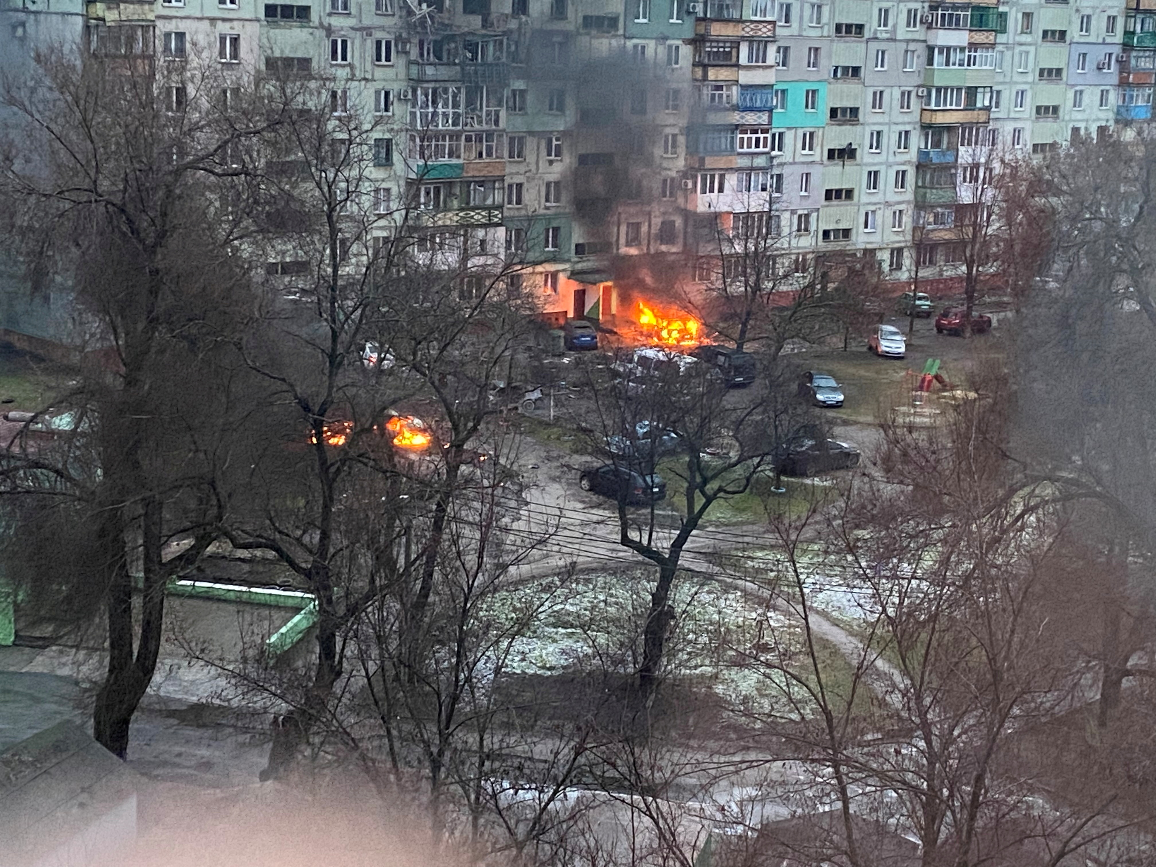 Fire is seen in Mariupol at residential area after shelling