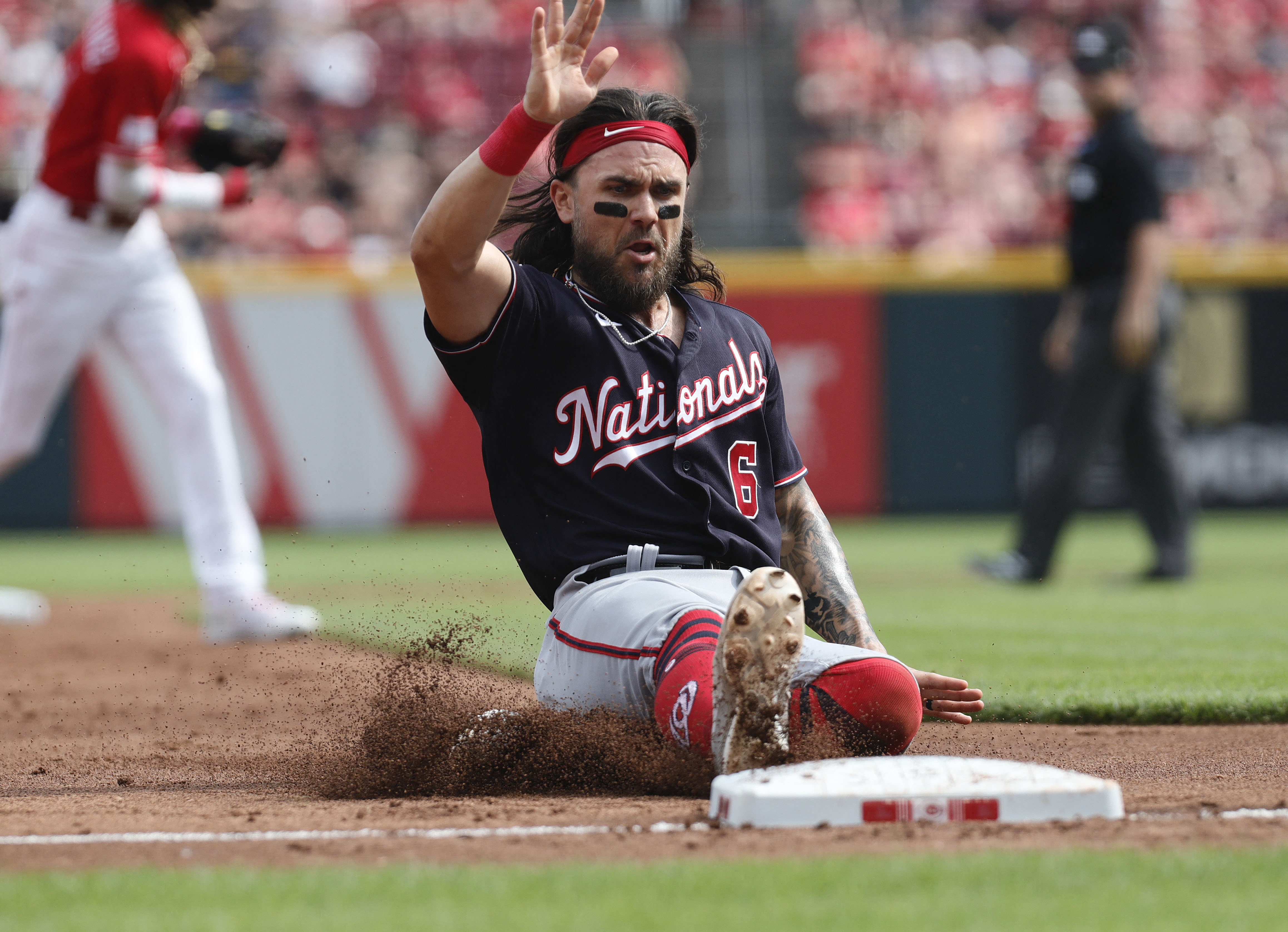 Nats extend Reds' slump behind Joan Adon's near-perfect start