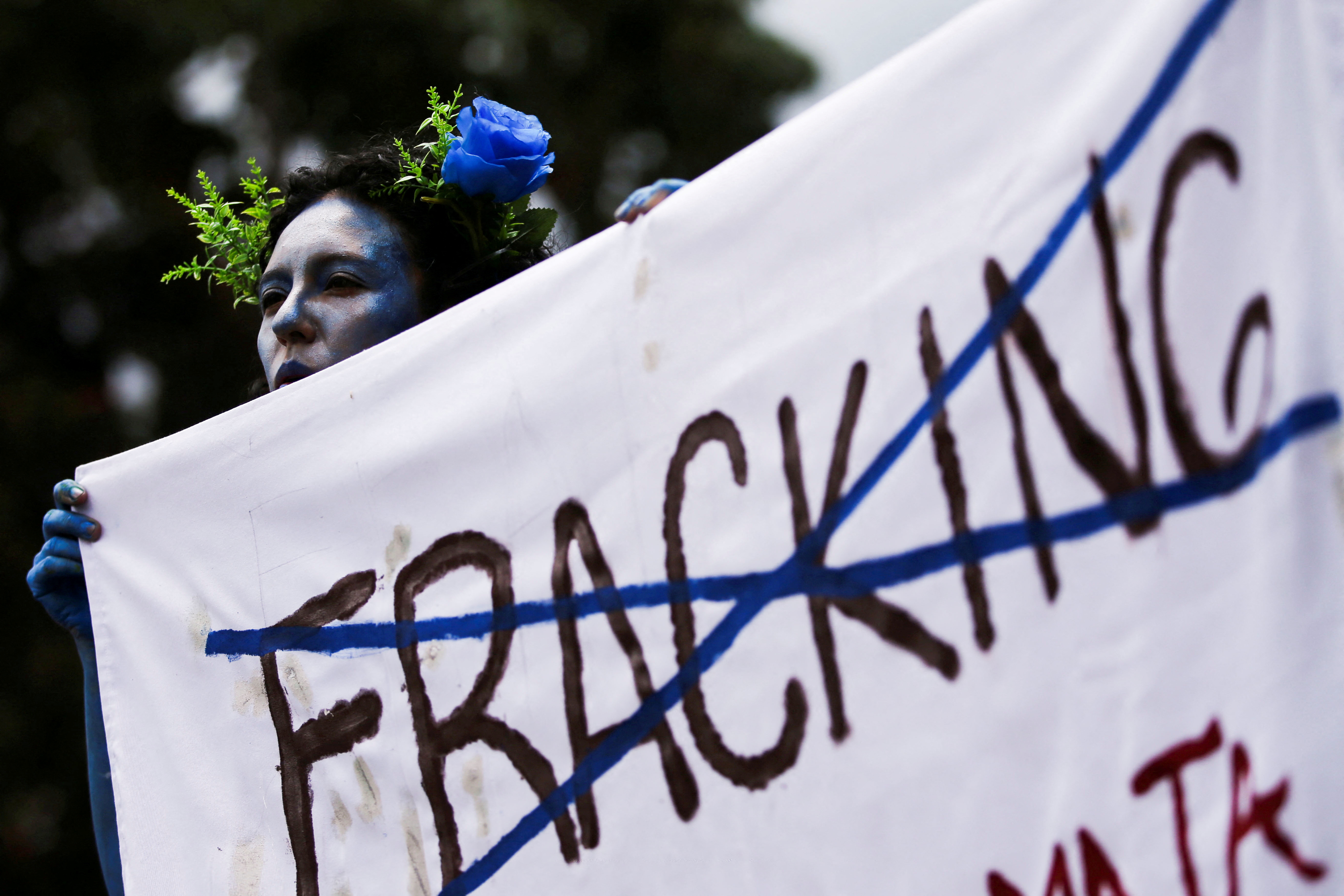 Members of Extinction Rebellion attend a protest against fracking pilot projects being promoted, according to them, by the national government, on Earth Day in Bogota