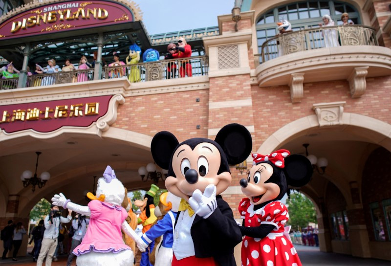 Disney characters Mickey Mouse and Minnie Mouse greet visitors at Shanghai Disney Resort as the Shanghai Disneyland theme park