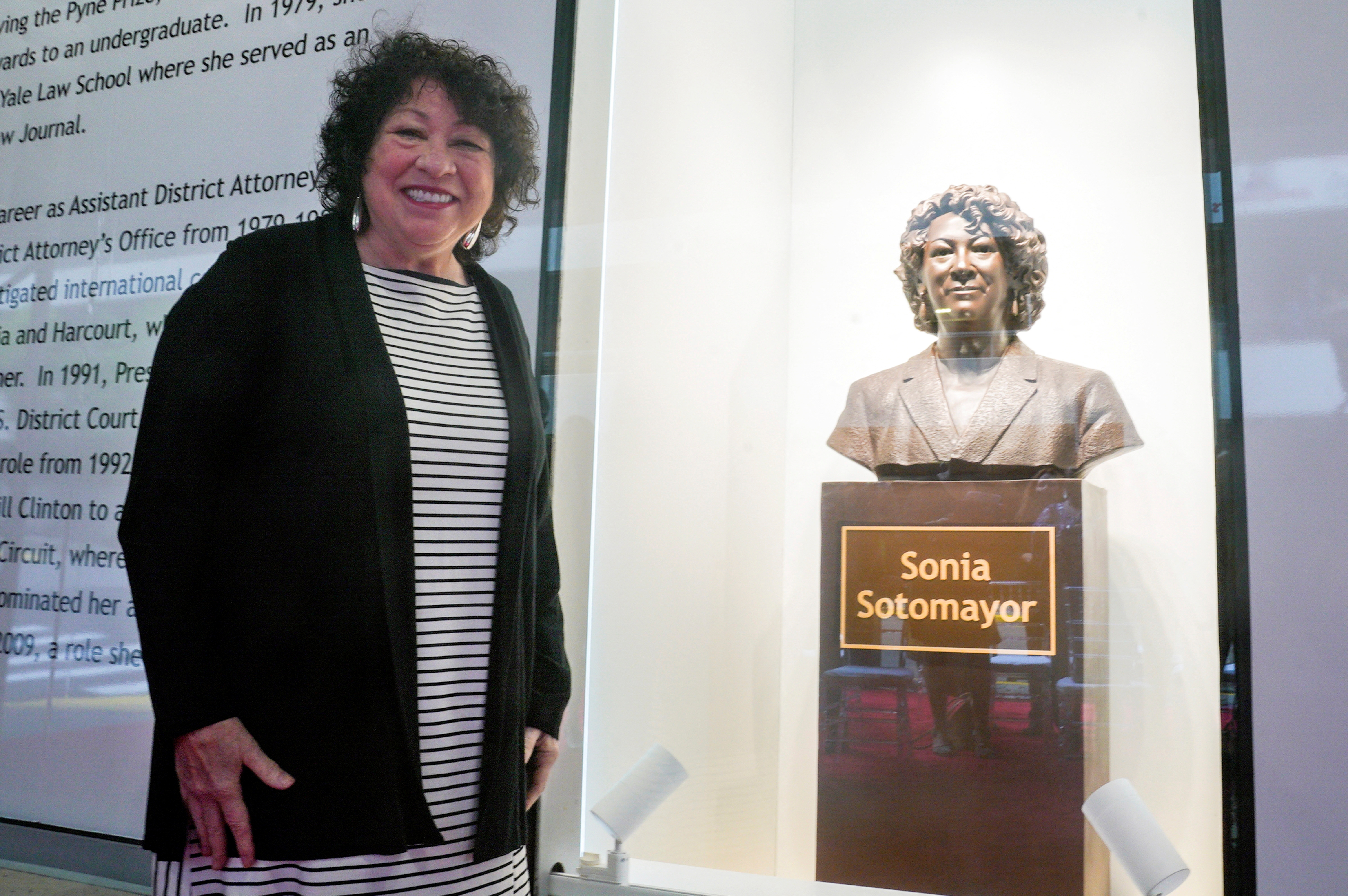 Supreme Court Associate Justice Sonia Sotomayor unveils a bronze bust of herself at the Bronx Terminal Market in New York