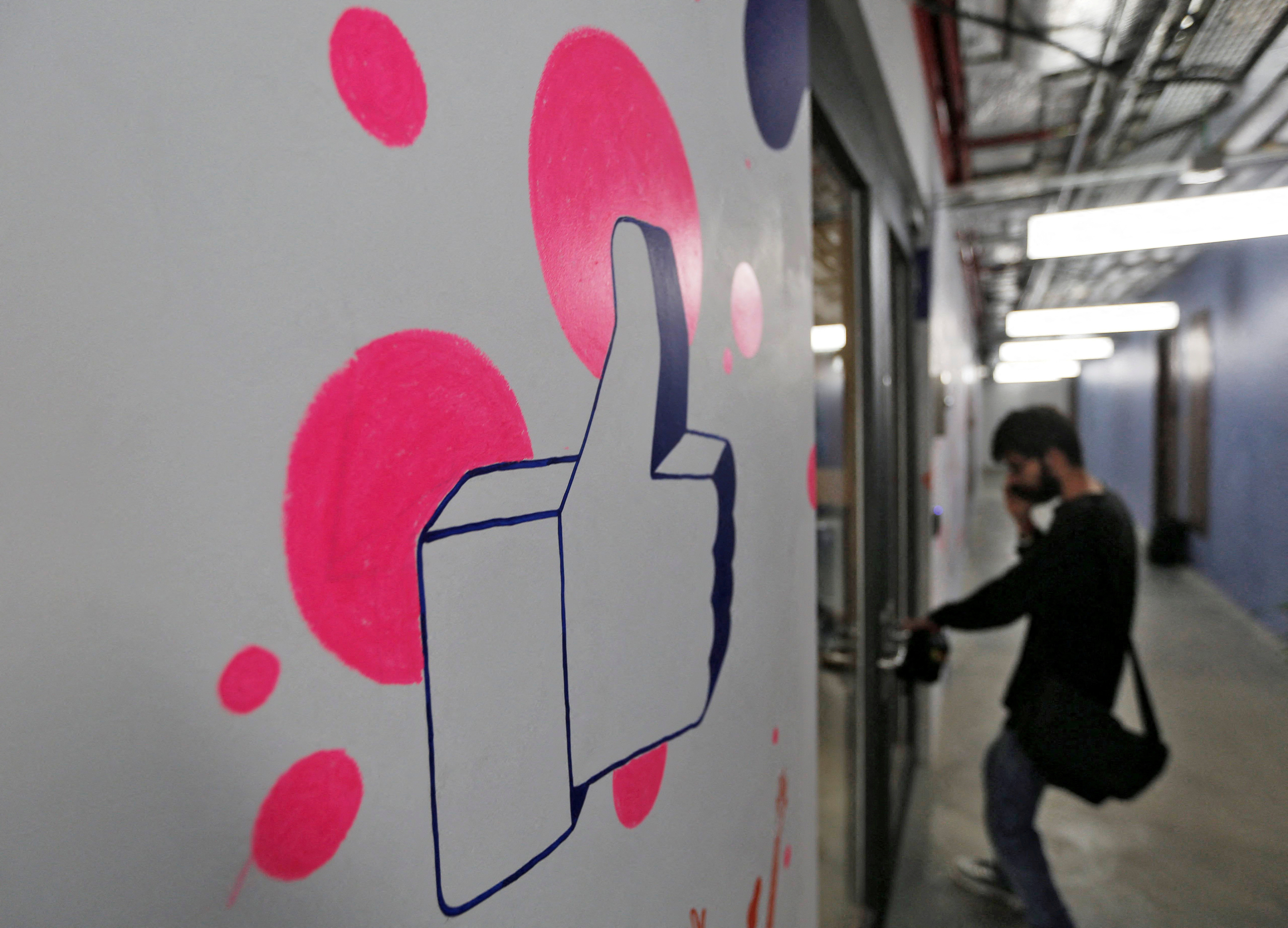 A man enters Facebook's new office in Mumbai