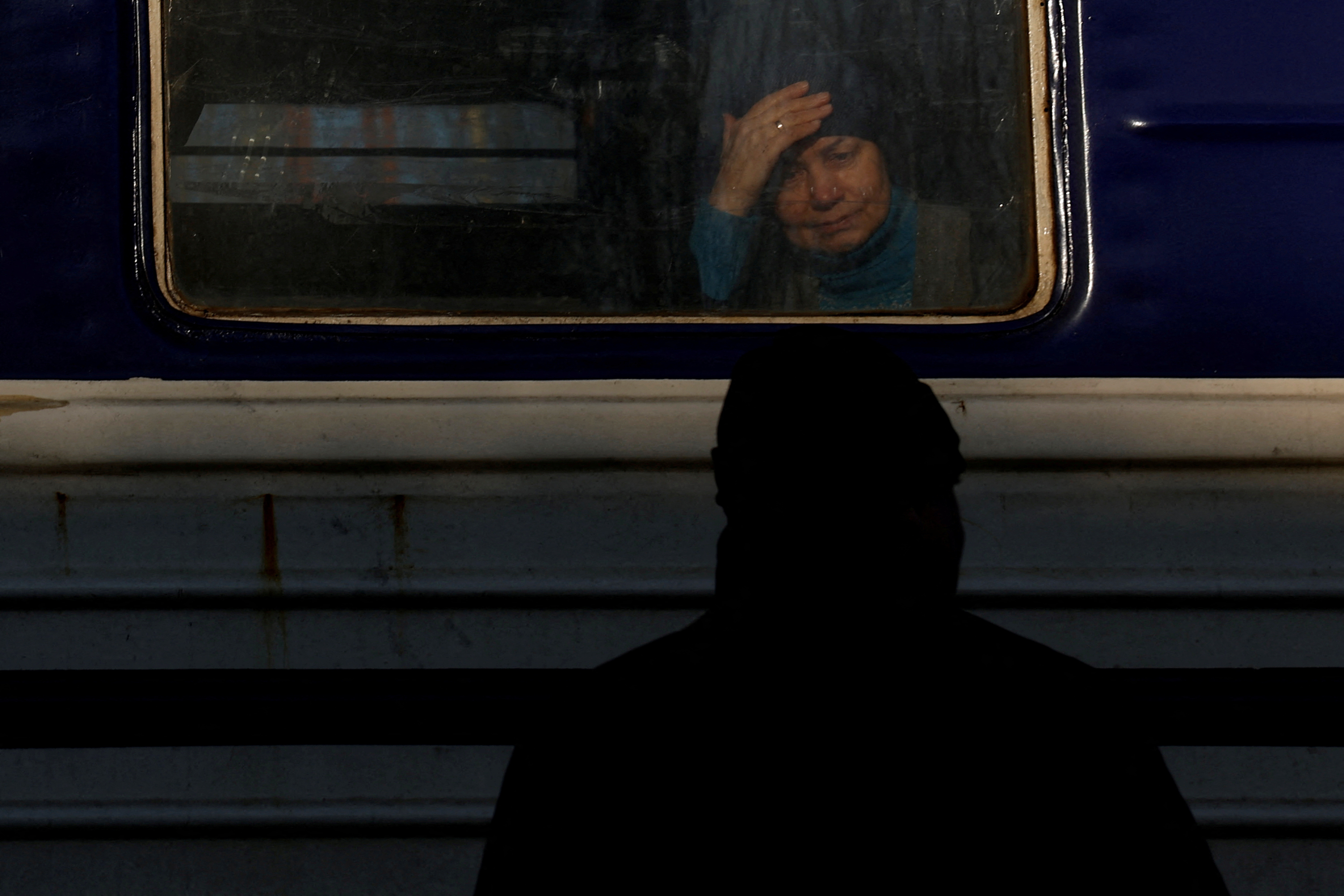 People board an evacuation train to Lviv, in Pokrovsk