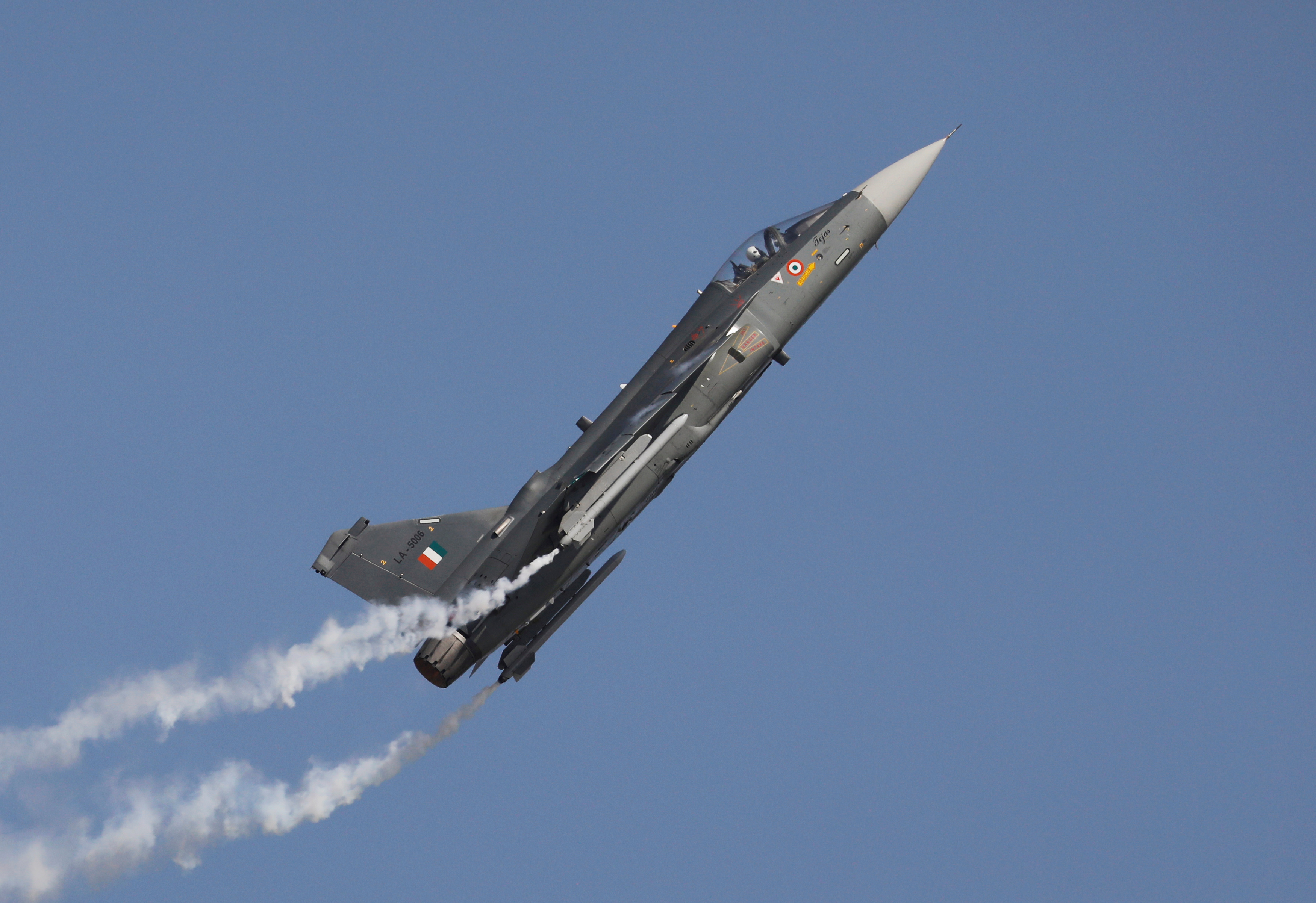 An Indian Air Force (IAF) light combat aircraft "Tejas" performs during the Indian Air Force Day celebrations at the Hindon Air Force Station on the outskirts of New Delhi