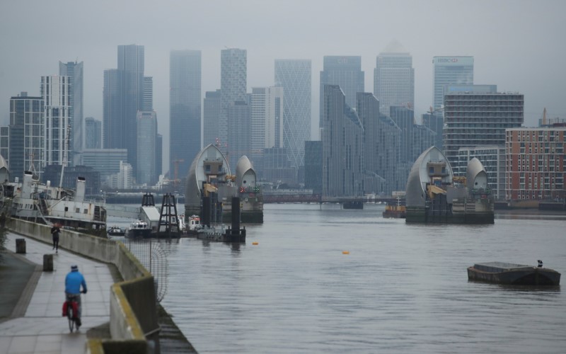 Buildings are seen in the Canary Wharf business district, amid the outbreak of the coronavirus disease (COVID-19), in London, Britain January 27, 2021. REUTERS/Peter Cziborra