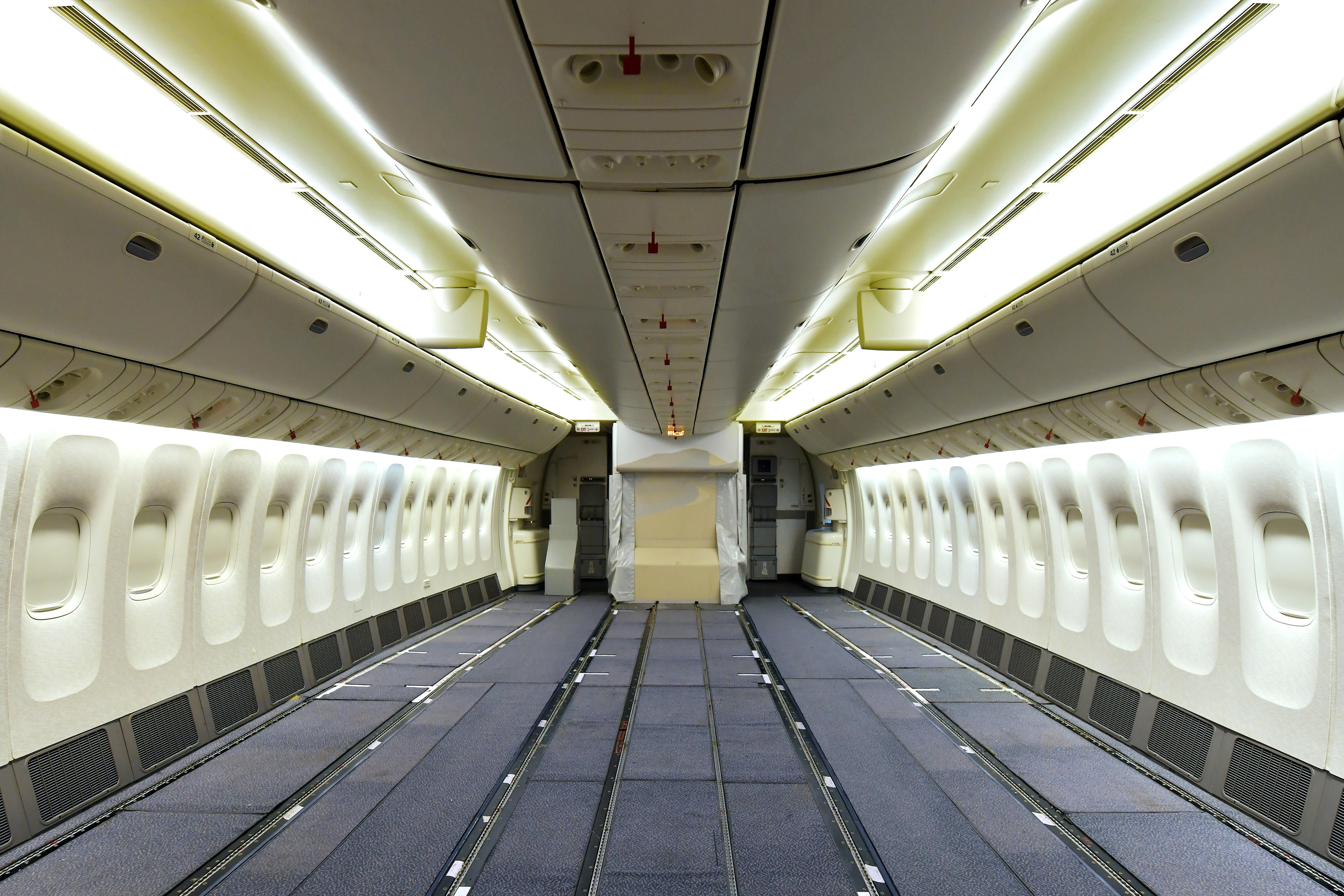 A general view of an Emirates Airlines' Boeing 777-300ER aircraft being modified to provide additional cargo capacity with seats removed from the economy class cabin, following the outbreak of the coronavirus disease (COVID-19), in Dubai